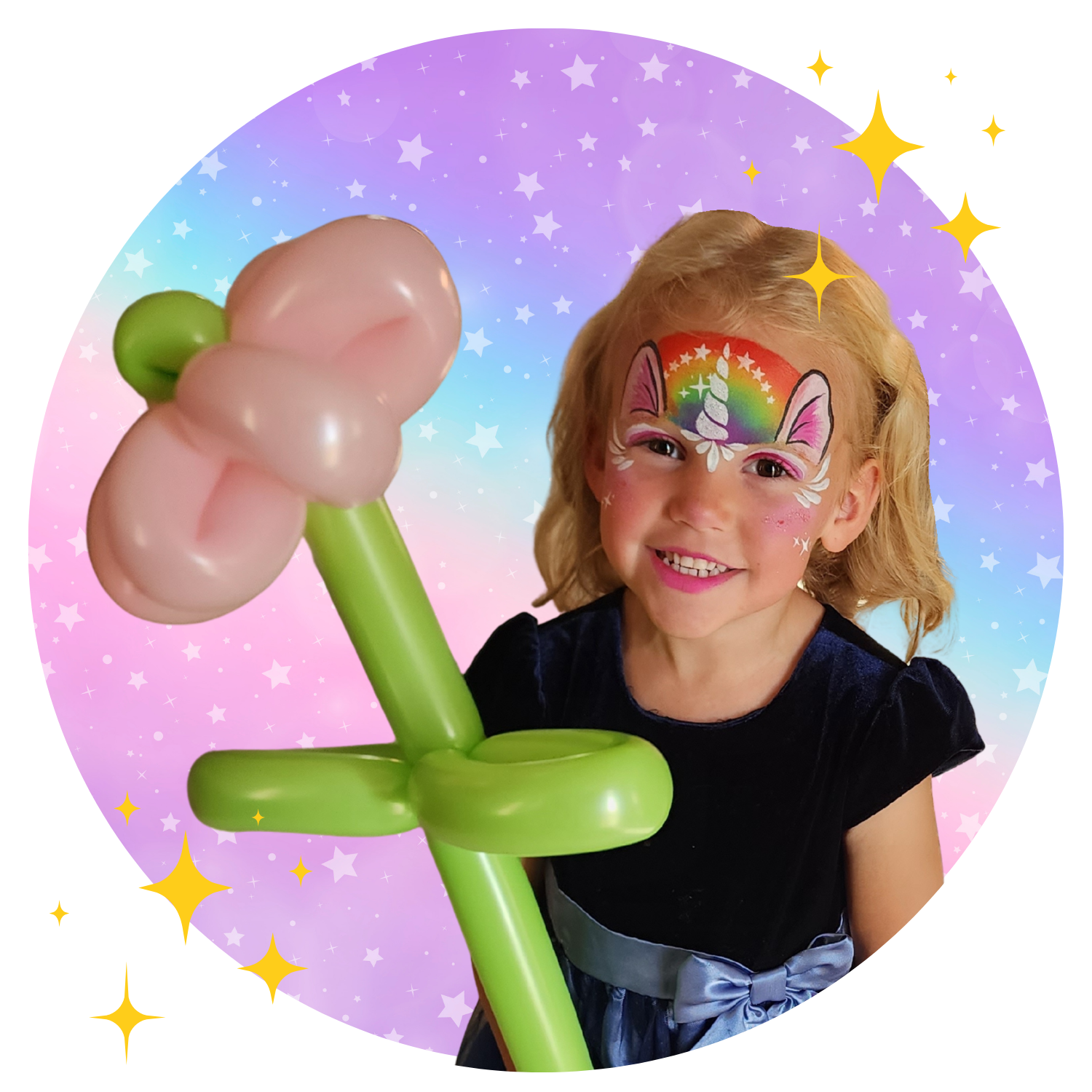A young girl with face paint of a unicorn, rainbow, and stars, holding a balloon sculpture of a pink flower with a green stem, against a colorful starry background in Vancouver BC