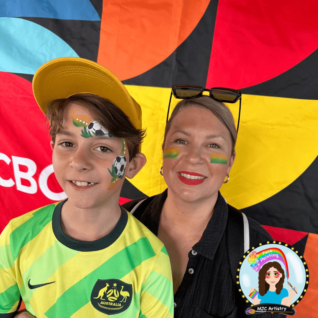 australia-fan-mother-son-face-painting-cbc-backdrop-fifa-world-cup-vancouver.png