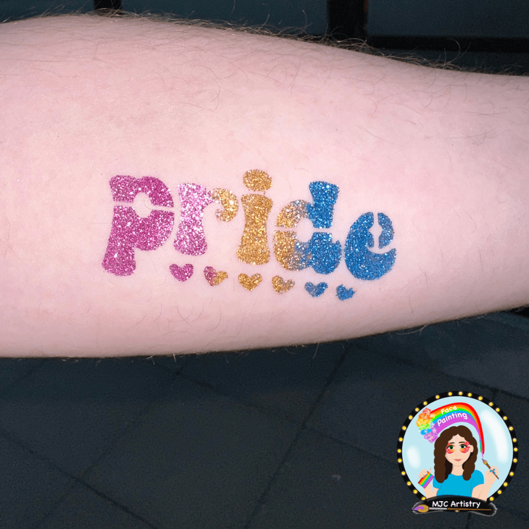 sparkly pride text glitter tattoo in rainbow colours on an arm
