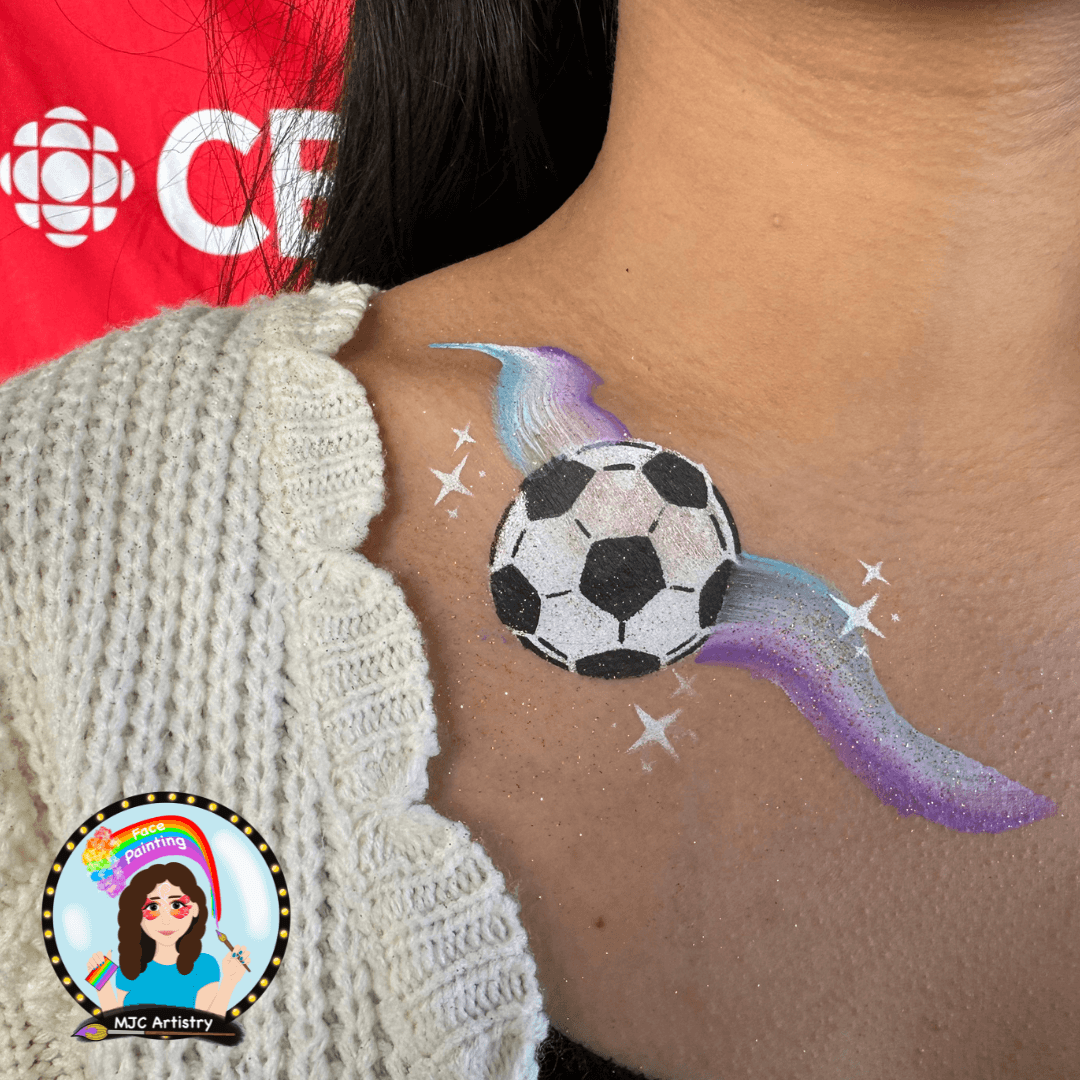 soccer-ball-purple-blue-swirl-glitter-chest-body-painting-cbc-fifa-world-cup-vancouver.png