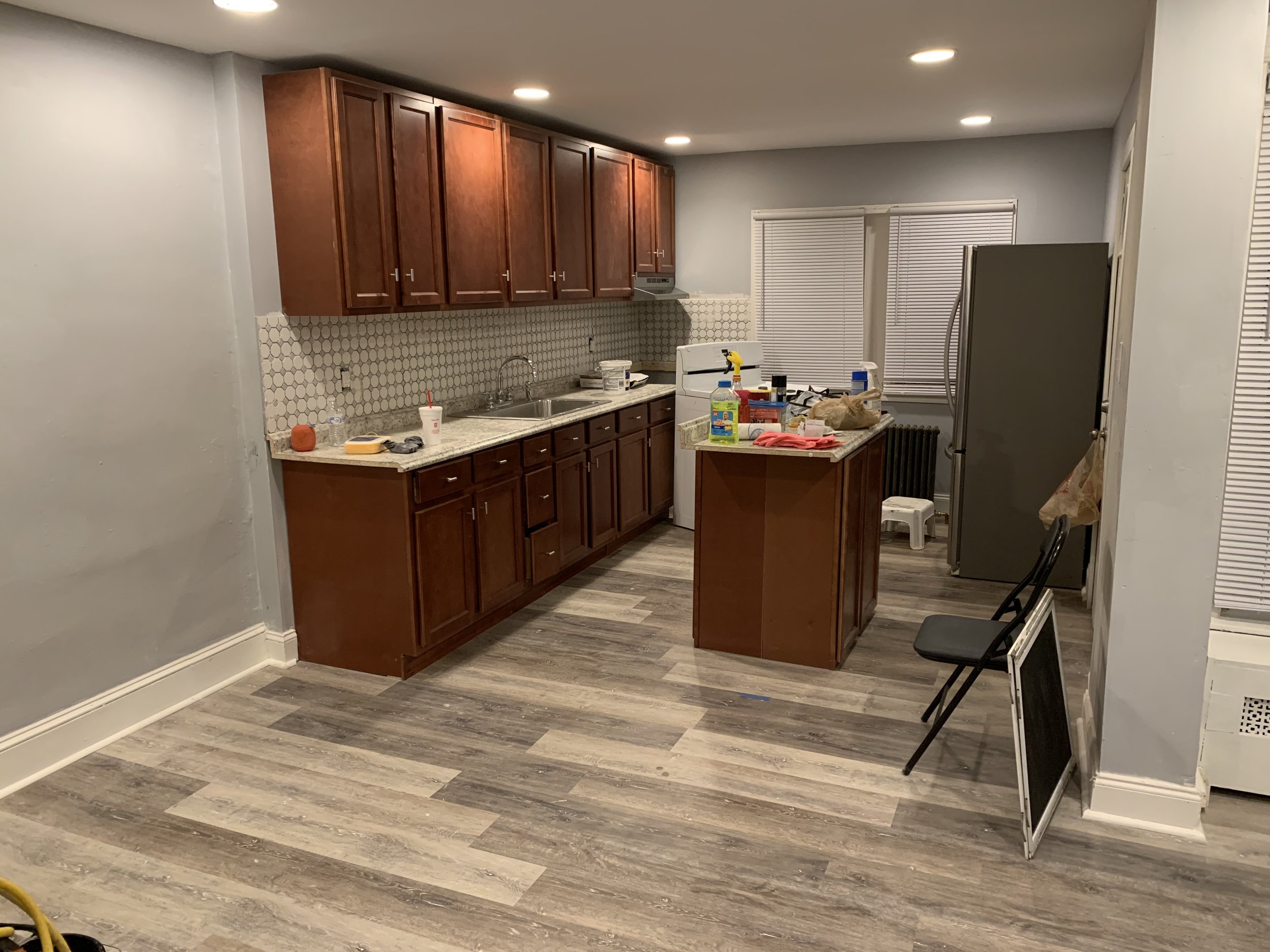 Kitchen remodel cabinets, island, LVP flooring