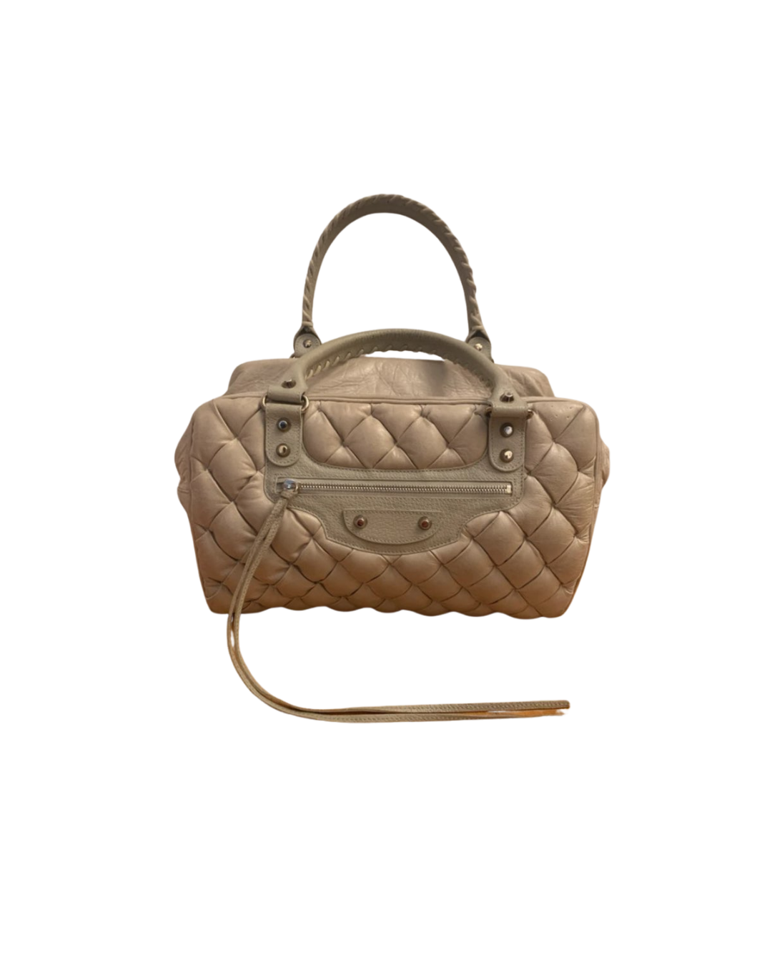 Beige quilted designer handbag with handles and a wrist strap on a black background.