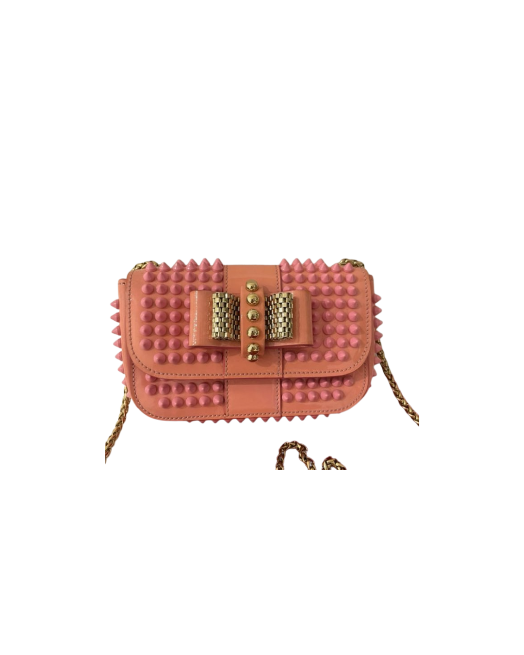 Pink handbag with gold chain strap, decorated with pink studs and a gold bow with a checkered gold and black center.
