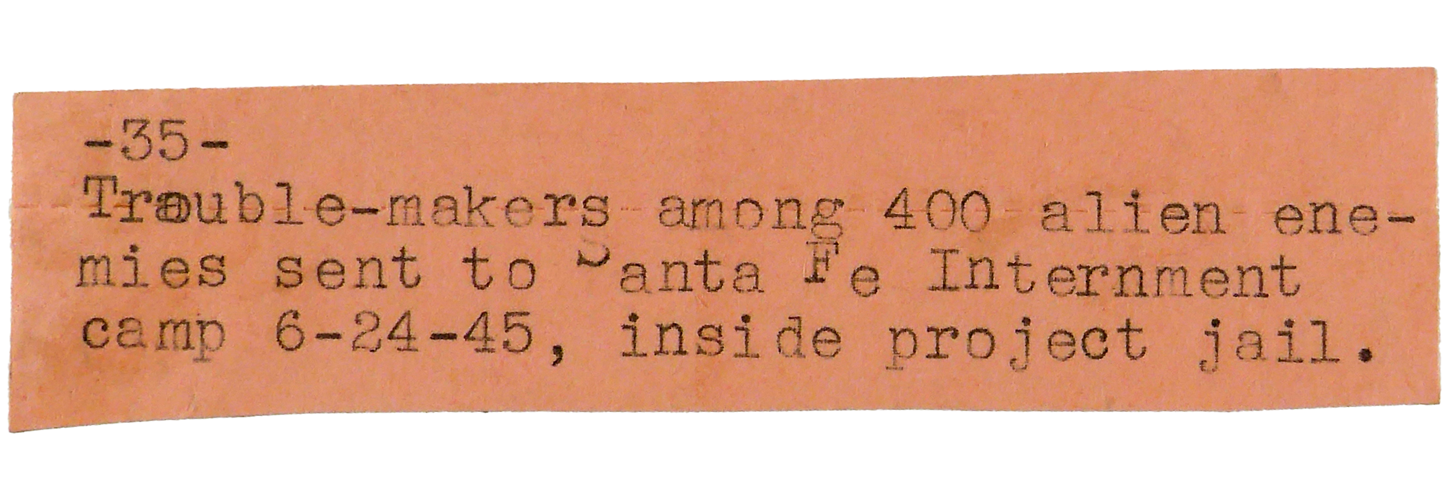 Typed note on pink paper mentioning trouble-makers sent to Santa Fe Internment camp 6-24-45.