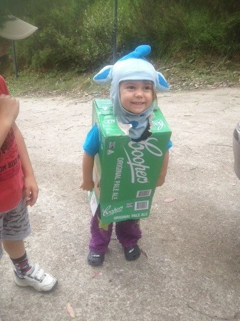 Tully in beer box w snow man hat.jpg