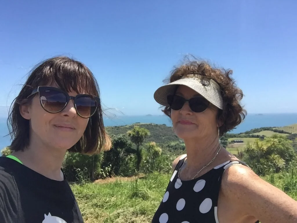 Photo of two women wearing sunglasses
