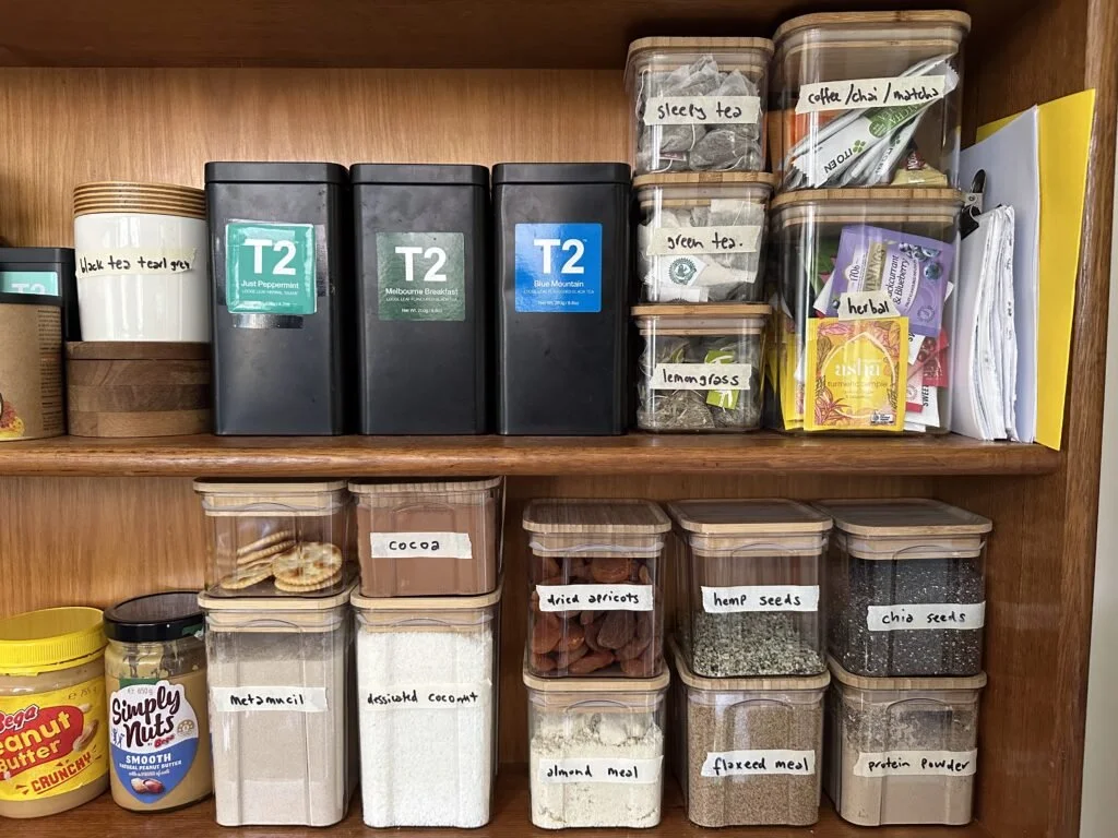 Photo of clear plastic kitchen containers labelled with their contents