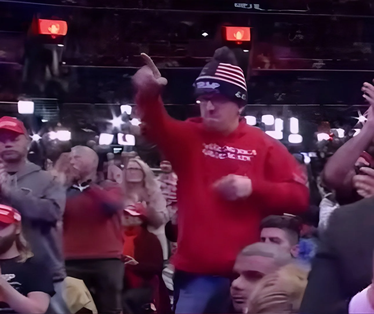 Nick Petersen fan pointing back at the Trumps inside Capital One Arena at Inauguration Day 2025