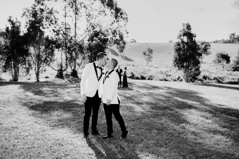 A photo of two men in a wedding by Lee Burgess from Love and Life Photography 