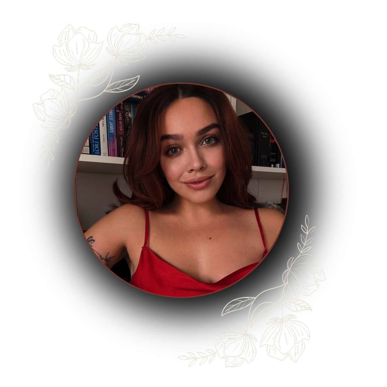 A woman with shoulder-length red hair, wearing a red spaghetti strap top, smiling at the camera with a bookshelf in the background, surrounded by decorative white floral illustrations on a black background.