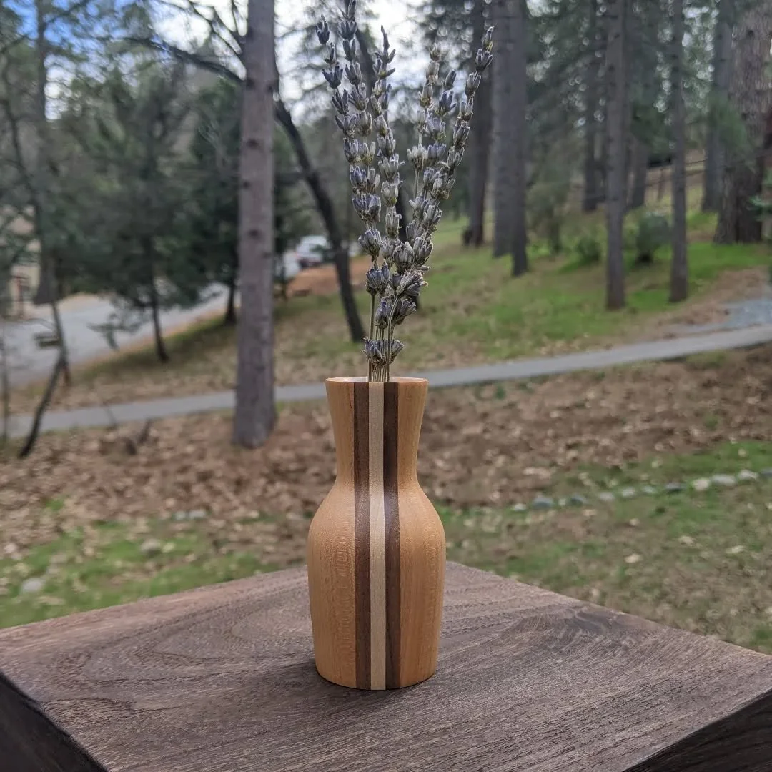 This one changed plans halfway through 🌿

It's laminated cherry, walnut, and maple blank came from a batch intended to make handles, but this particular piece seemed too fitting to be a twig pot instead. 

Sometimes the best pieces are the ones that