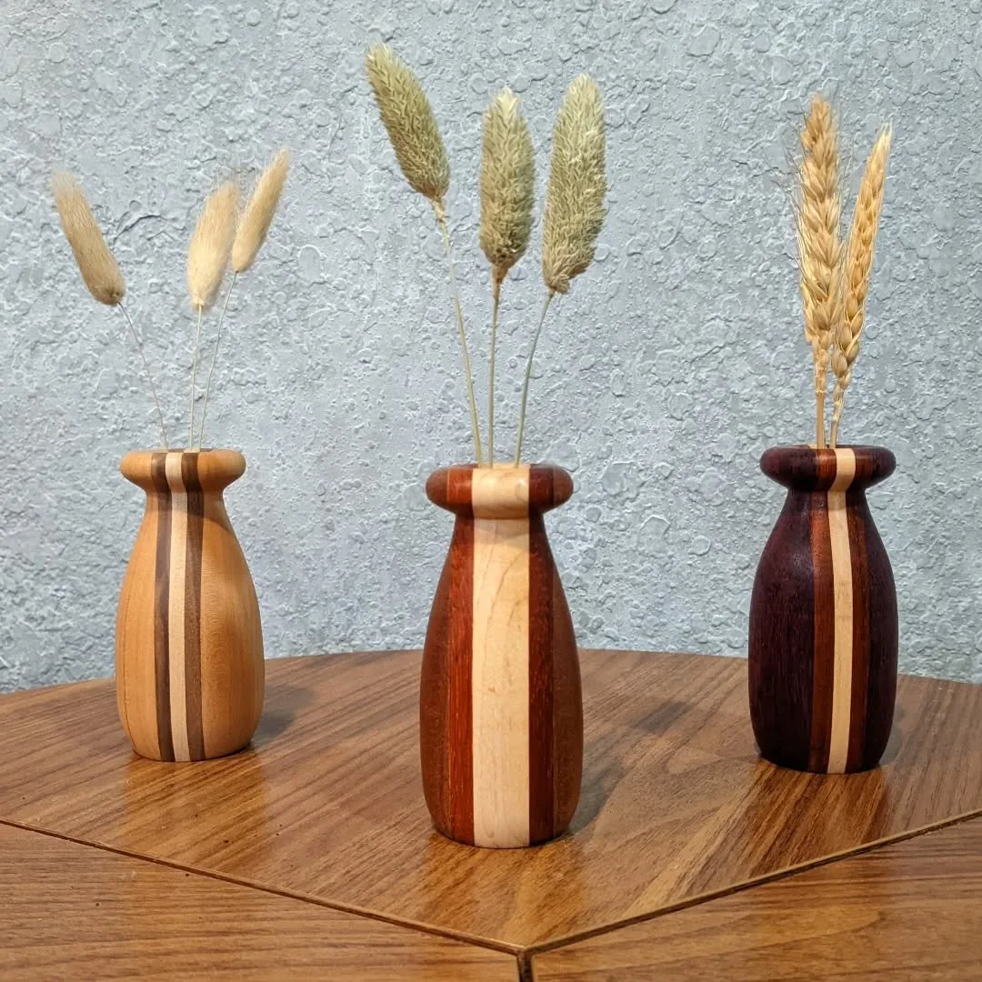 Three twig vases, each with a slightly different style🔥 The Cherry one on the left might be my favorite. 

#woodturning #woodworking #woodart #handcrafted #handmade