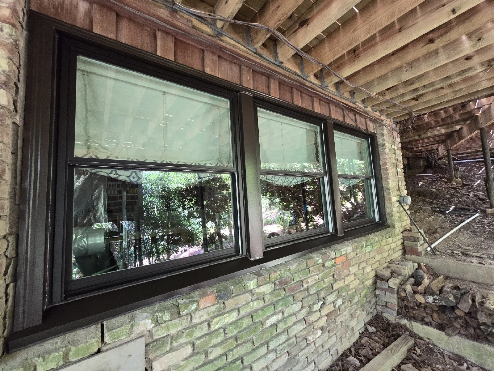 AFTER. We completed an extensive window replacement, carefully rebuilding and installing each window to ensure proper sealing, structural integrity, and long-term performance. The result is a fully revived space with beautifully installed windows tha