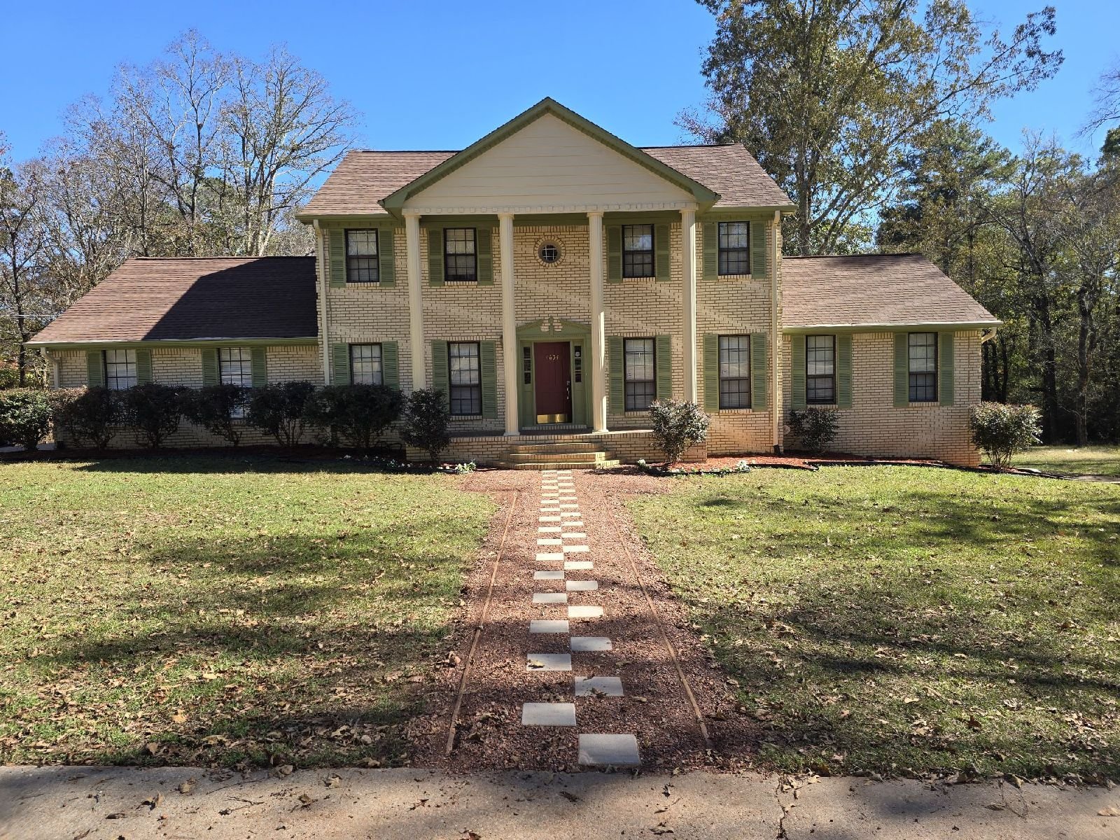 We completed a full exterior refresh, updating the siding, shutters, and windows, repairing the fence, and building a new deck designed for both durability and everyday use. 