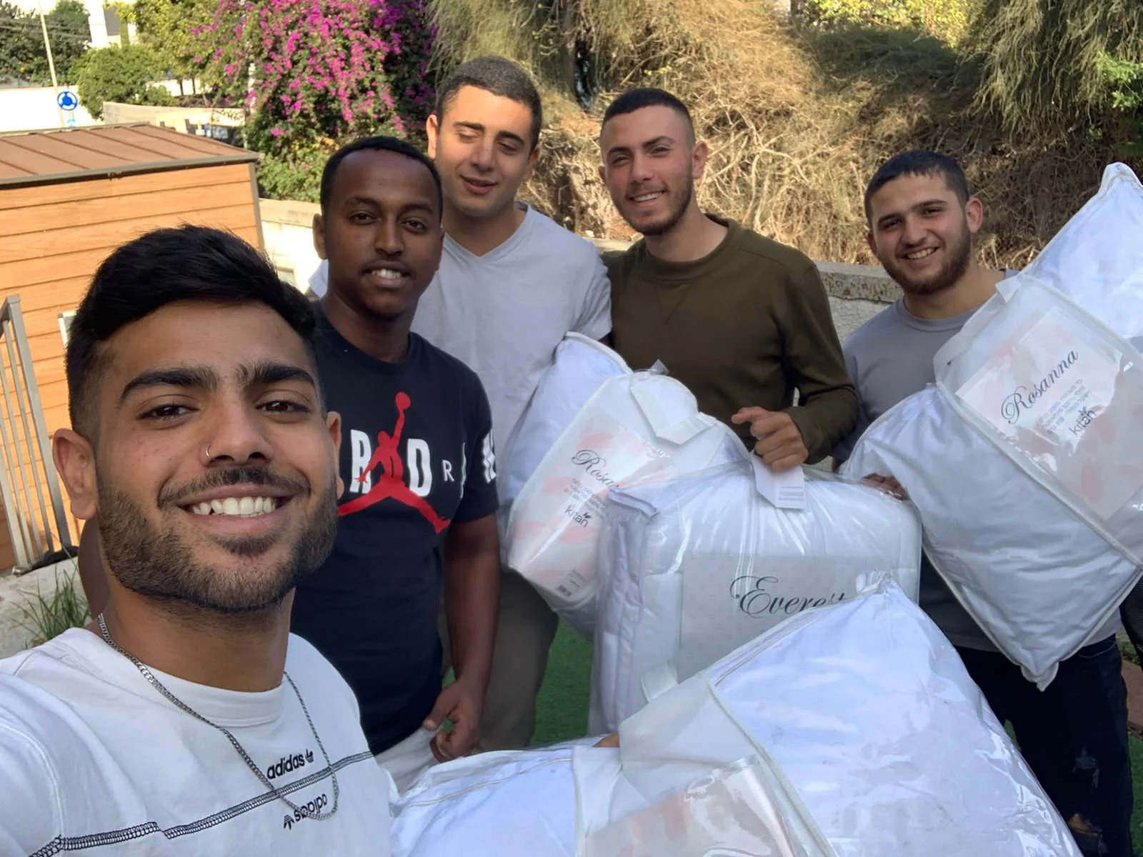 five soldiers holding pillows.jpg