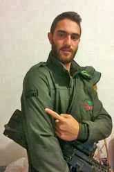 lone soldier pointing to arm.jpg