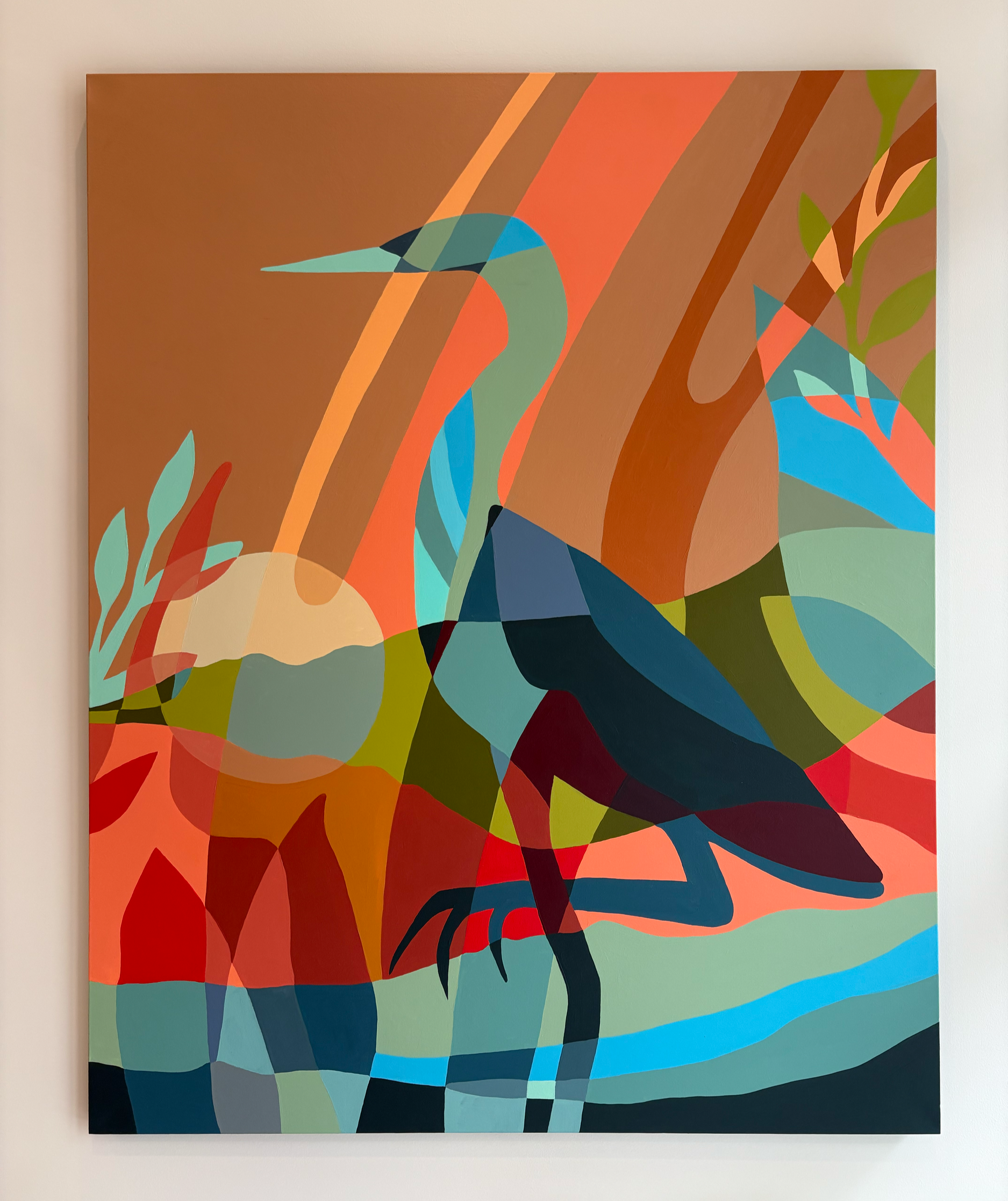 An abstract painting of a heron standing on one leg in a natural setting with trees, leaves, and water, created with bold, colorful shapes. Kelowna BC. Liz Grace Studio, Liz Dumontet