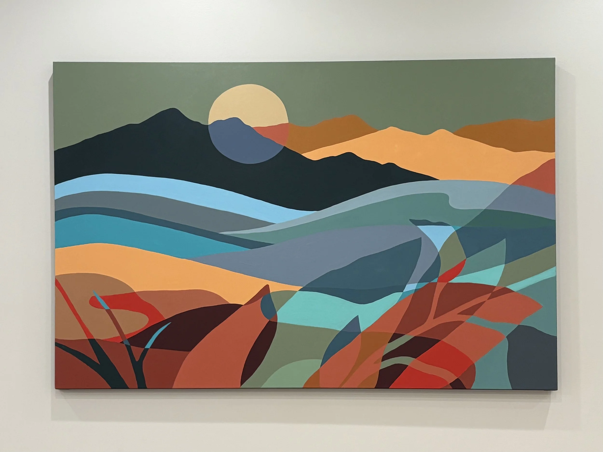 Abstract landscape painting featuring mountains, hills, and a setting sun with layered shapes in earthy tones of green, blue, orange, and red.