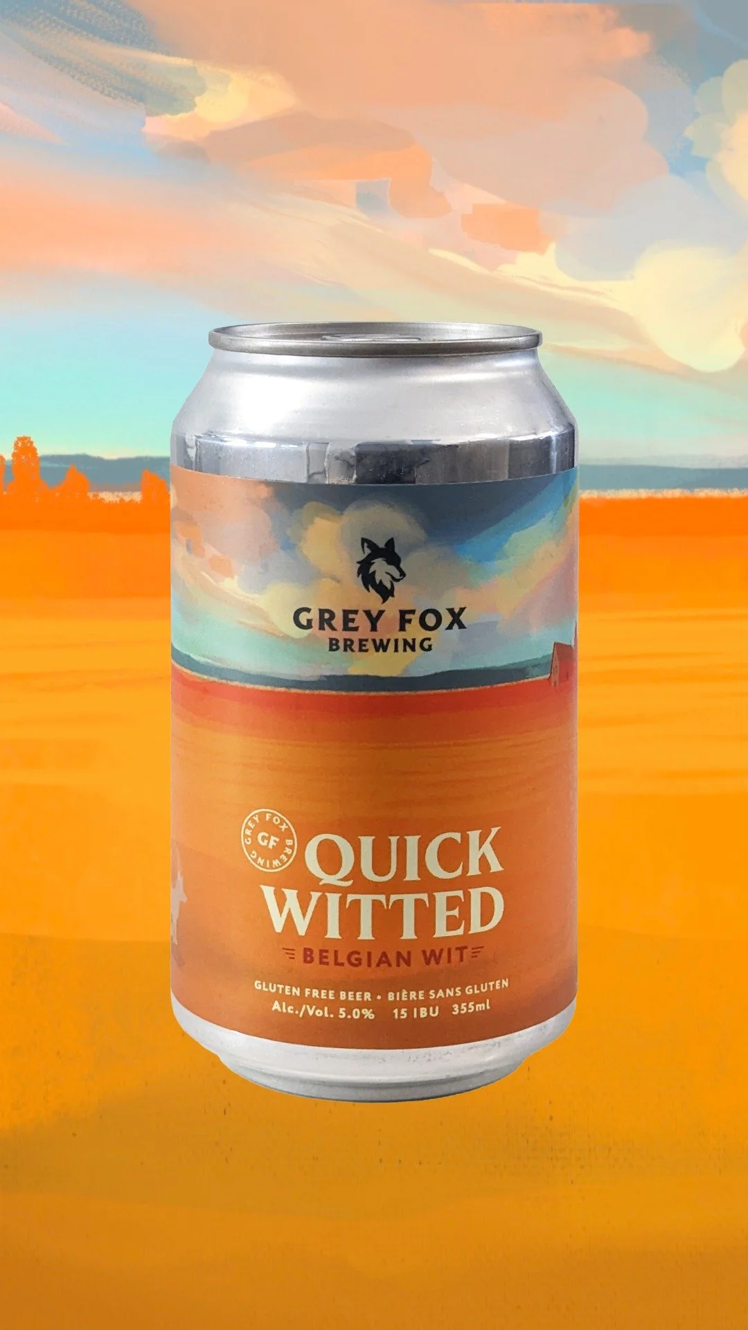 A can of Grey Fox Brewing Quick Witted Belgian Wit beer. The label features a painted landscape with a colorful sky, fields, and a silhouette of a house, with the Grey Fox Brewing logo at the top.