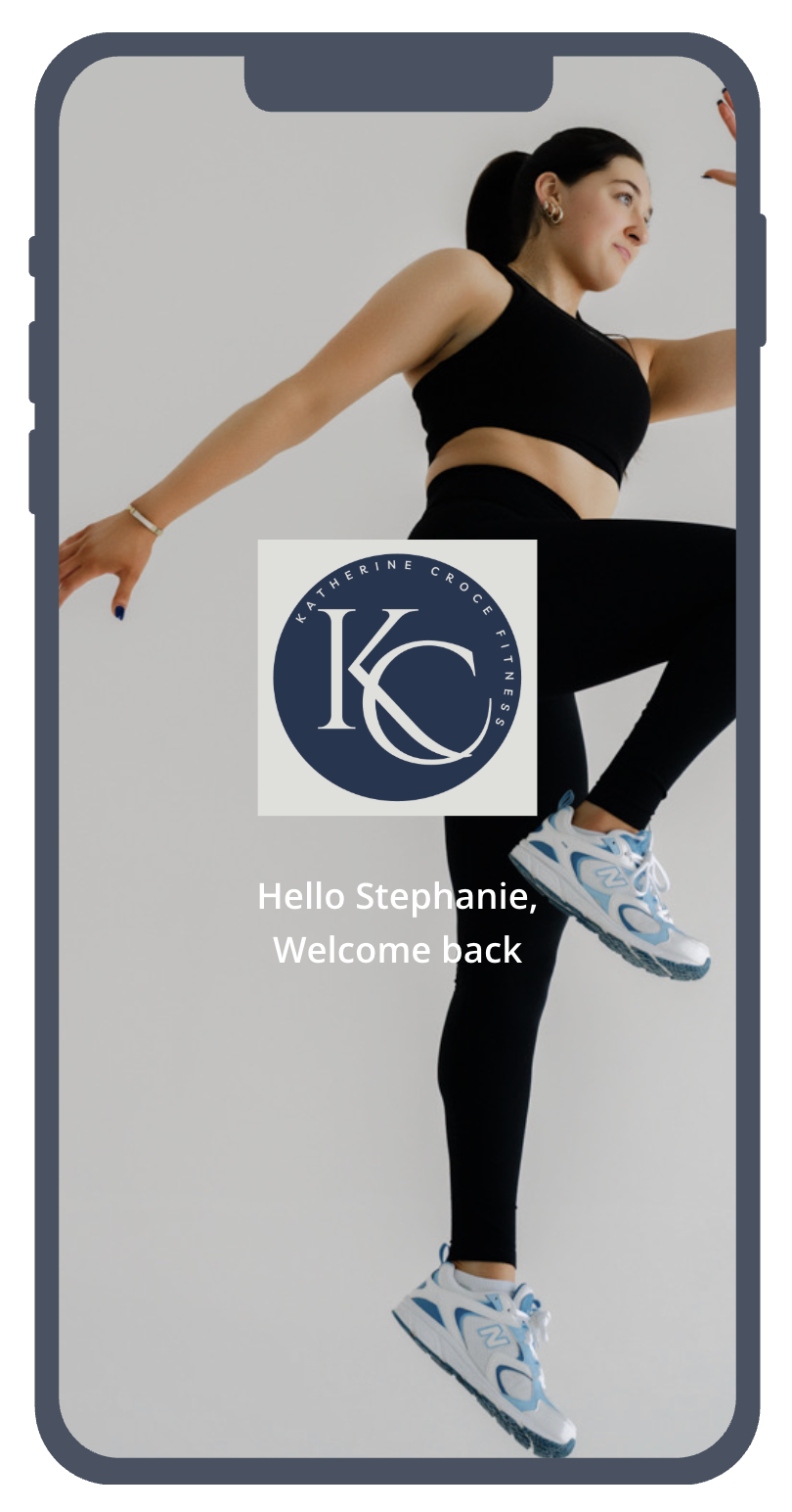 A woman in black workout clothes with white and blue sneakers, balancing on one leg with her other knee raised, inside a smartphone frame. A logo for Katherine Croce Fitness is overlaid on her midsection, along with the text 'Hello Stephanie, Welcome back'.