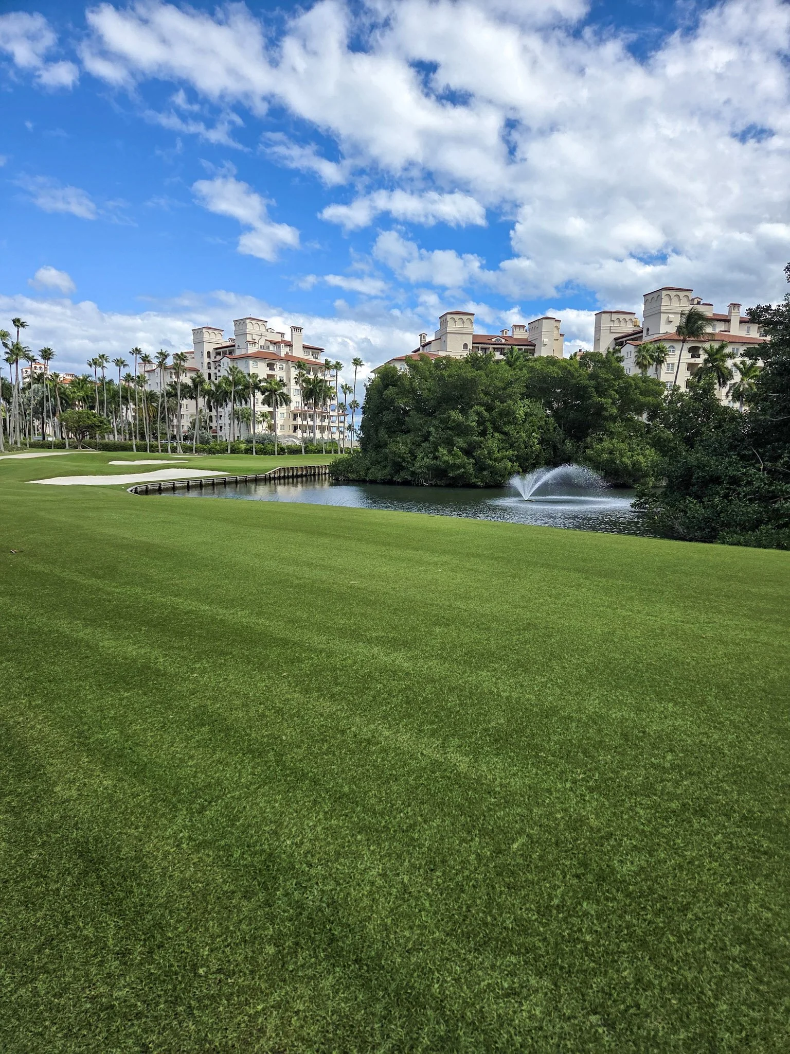 supreme-paspalum-golf-fairway-fountain-fisher-island-miami.jpg