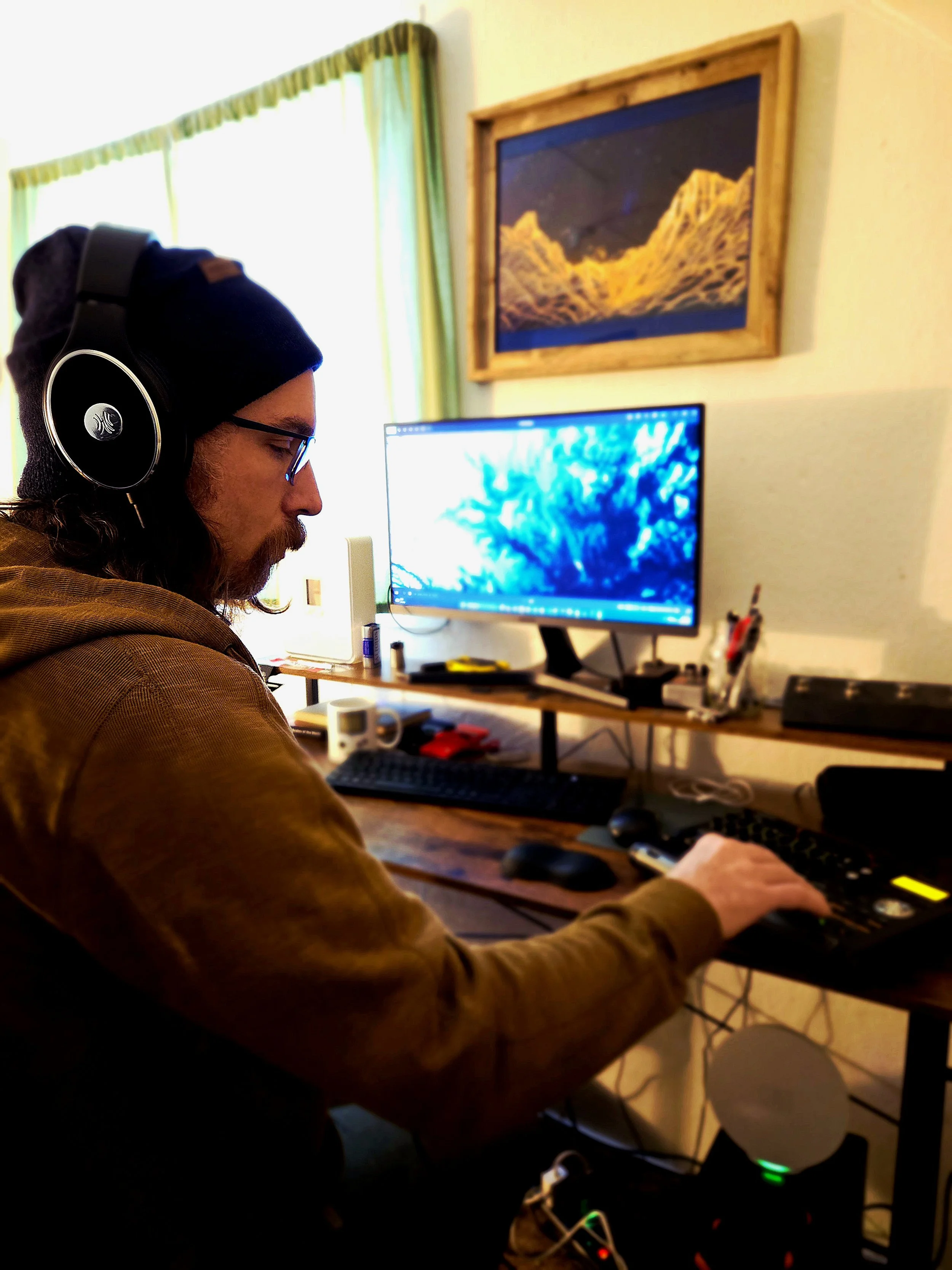 Chris Crecelius working on music in home studio