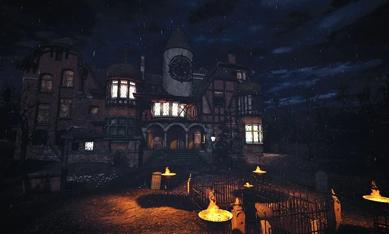 A dark, eerie mansion at night, illuminated by flames in fire pits in the foreground. Manor of Escape VR Escape Room