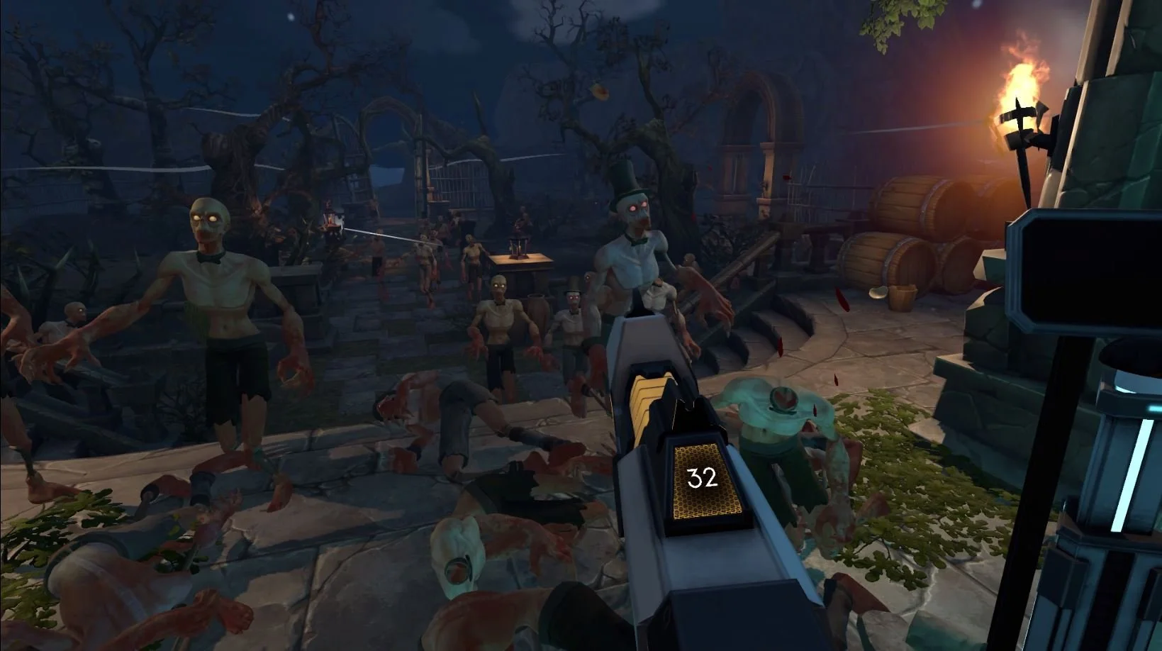 First-person view of a zombie shooter video game scene with several zombies approaching in a dark, eerie setting with dead trees, barrels, and a wrought iron gate, as the player aims a gun at the zombies. VR zombie shooter