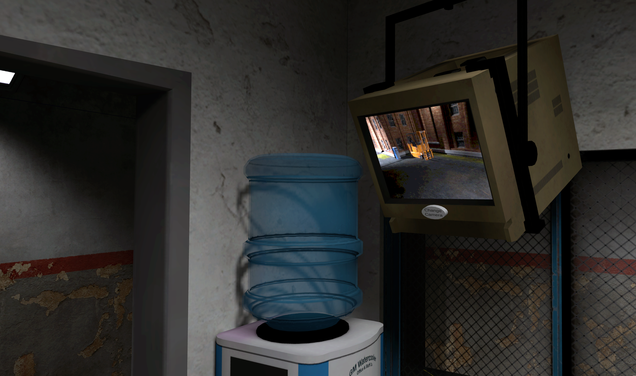 A security monitor displaying a view of a warehouse yard with machinery, a water cooler with a blue water jug, and a textured wall with peeling paint. B-Block Breakout VR Escape Room
