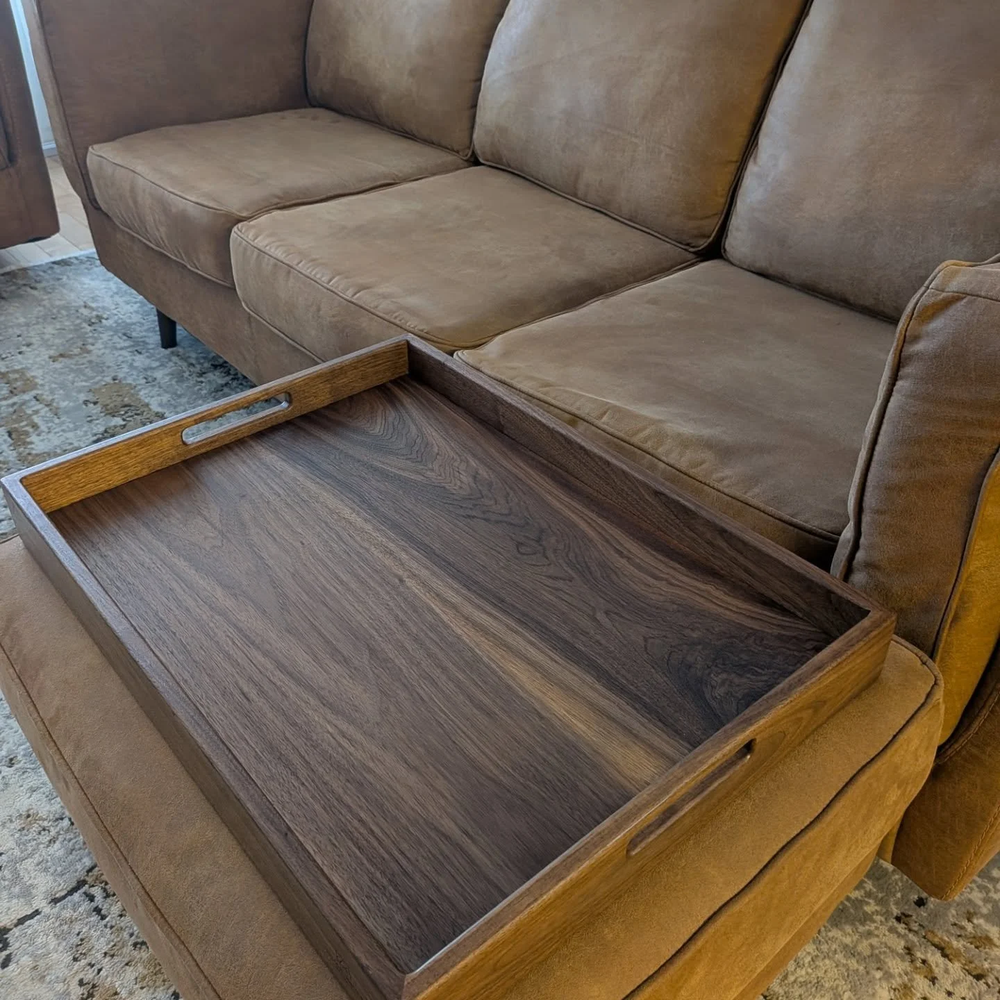 Form, meet function. ✨

There&rsquo;s something about the warmth of solid walnut that instantly grounds a room. This oversized tray was designed specifically for ottoman use&mdash;turning a soft surface into a functional tabletop without losing that 