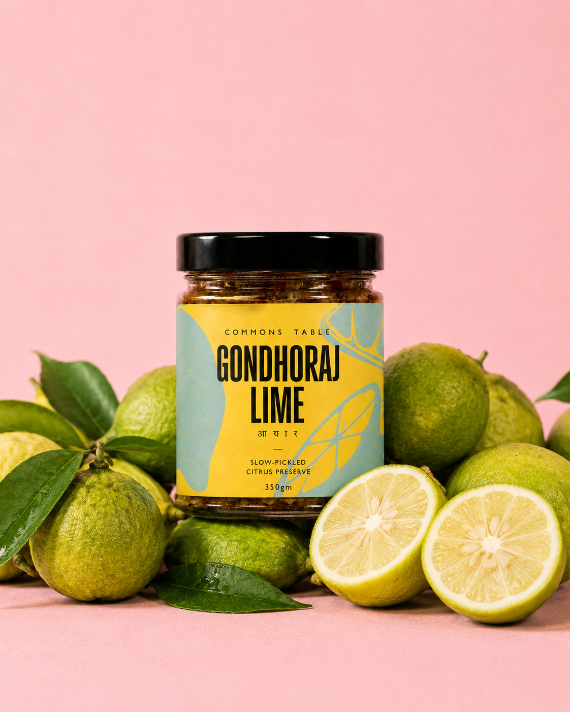 Gondhoraj Lime pickle jar packaging design for Commons Table, styled with fresh limes