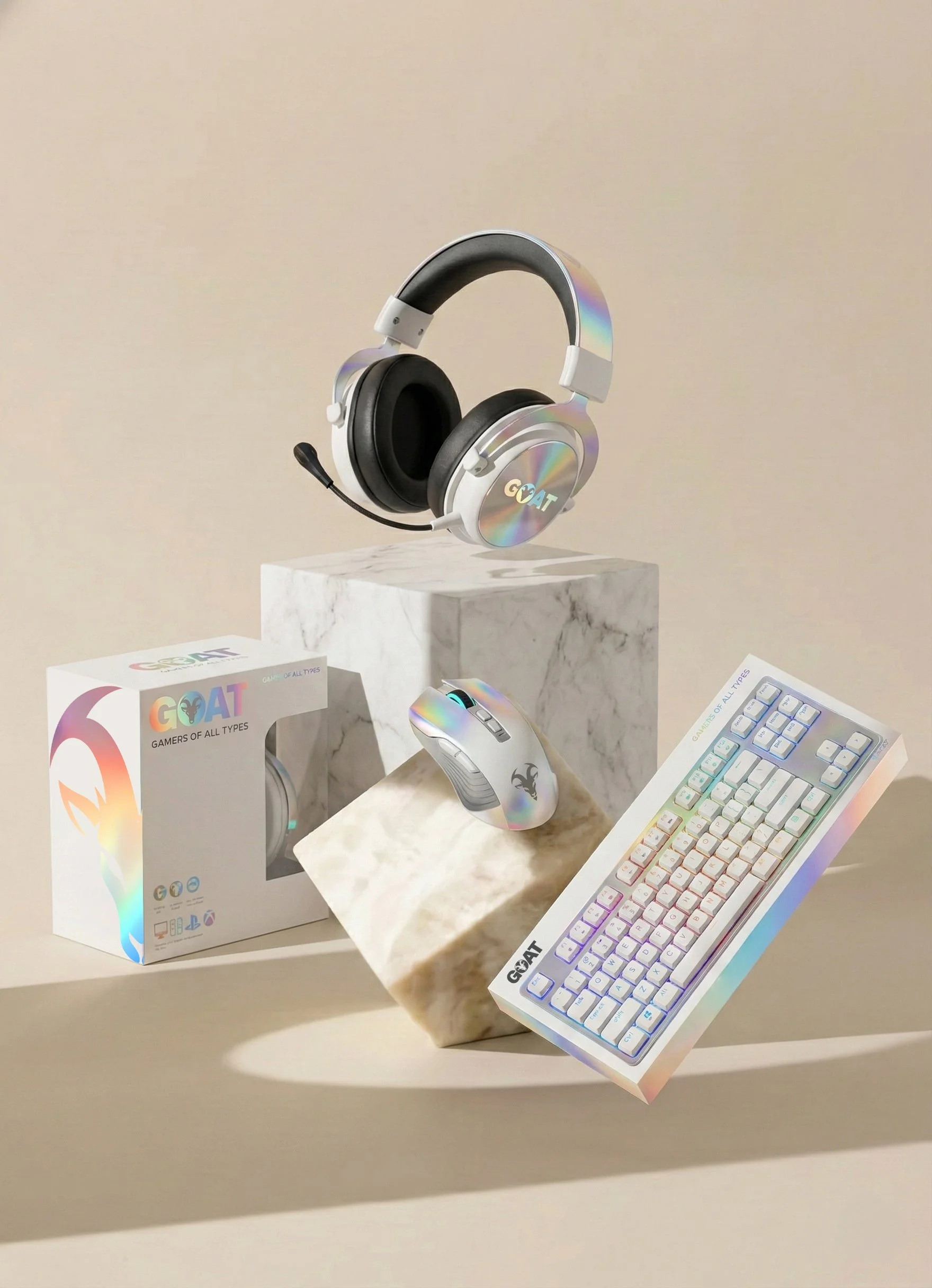 GOAT gaming peripherals brand identity — holographic headset, mouse, keyboard, and packaging design