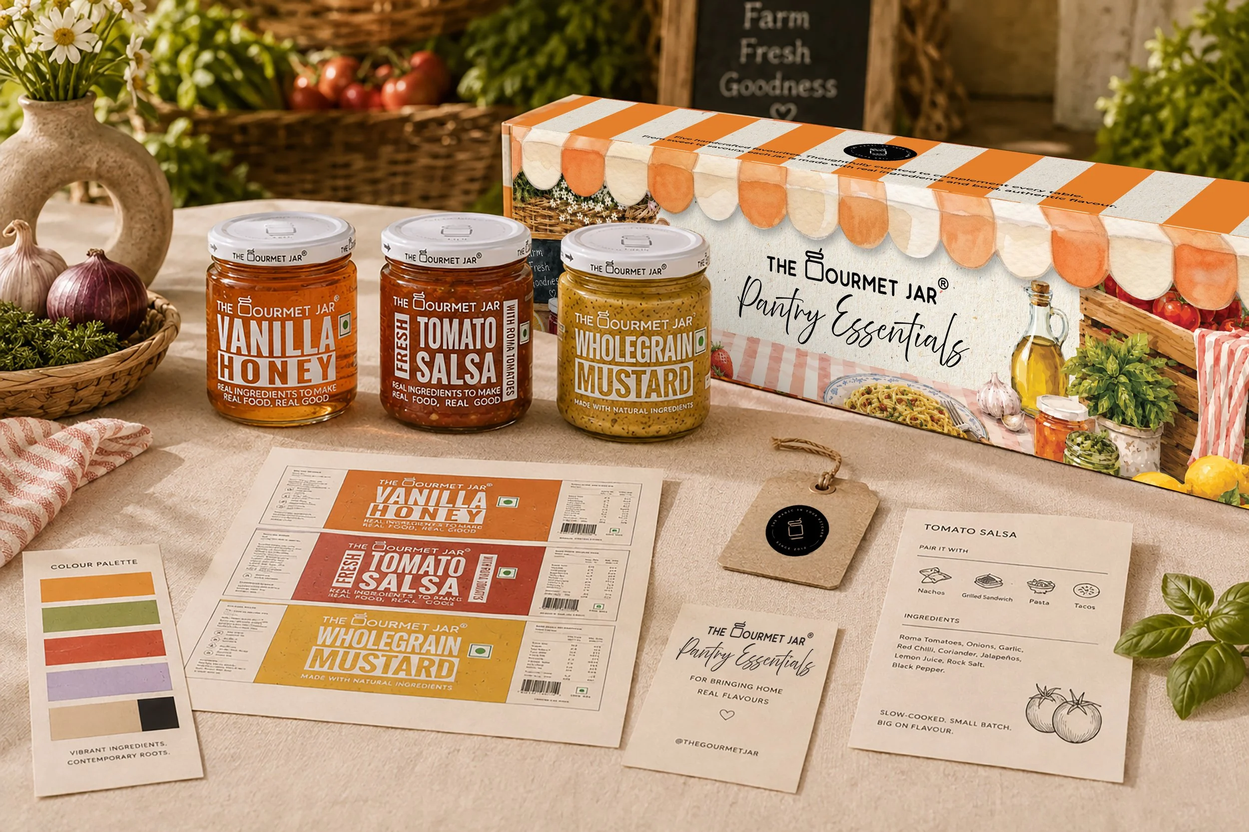 The Gourmet Jar brand identity system — packaging, gift box, and printed collateral shown together