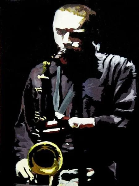 A person playing a saxophone, wearing dark clothing, with a dark background.