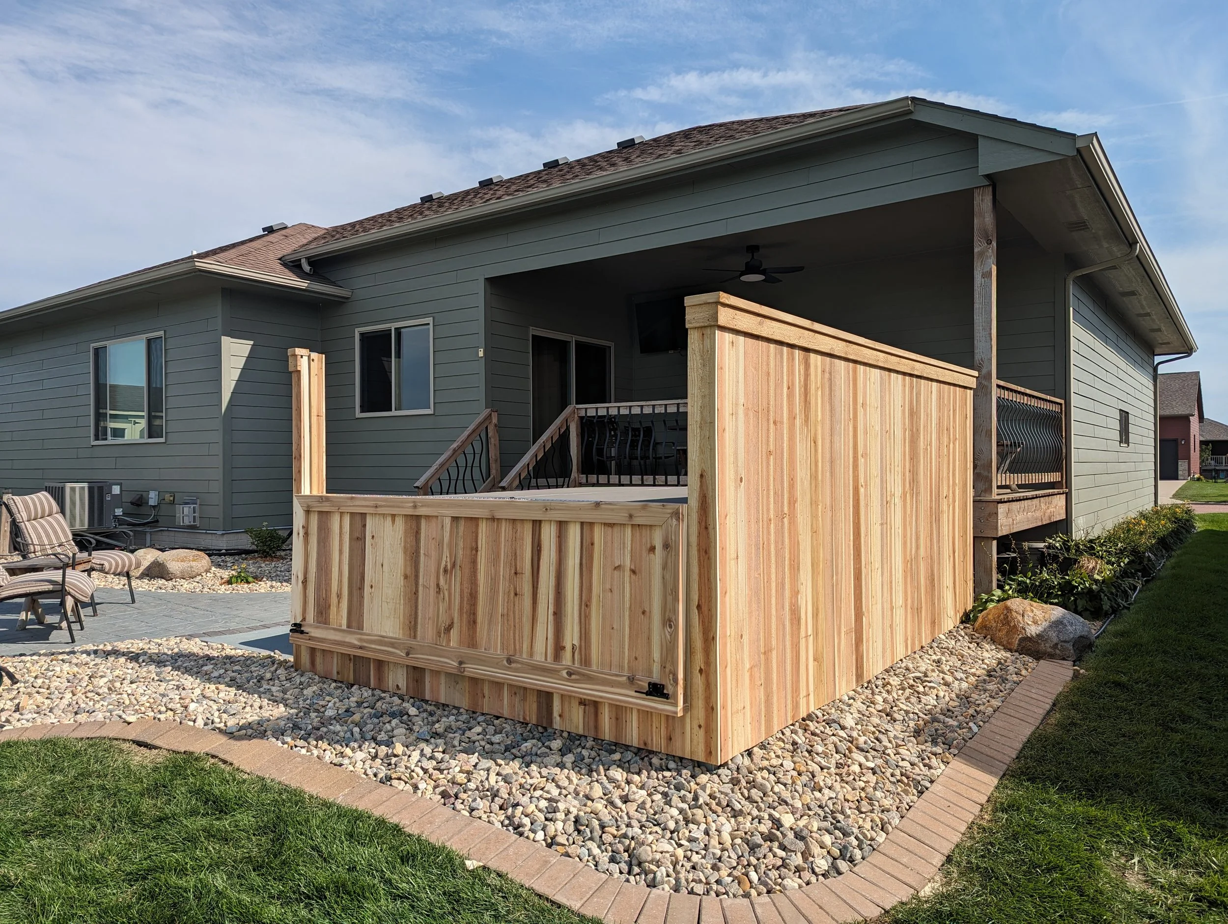 6 ft Cedar cap board with a hinge to open a "window"