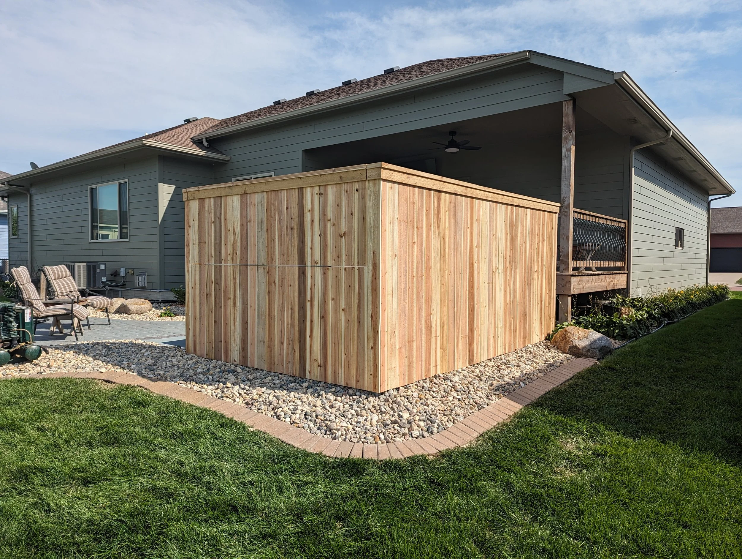 6 ft Cedar cap board with a hinge to open a "window"