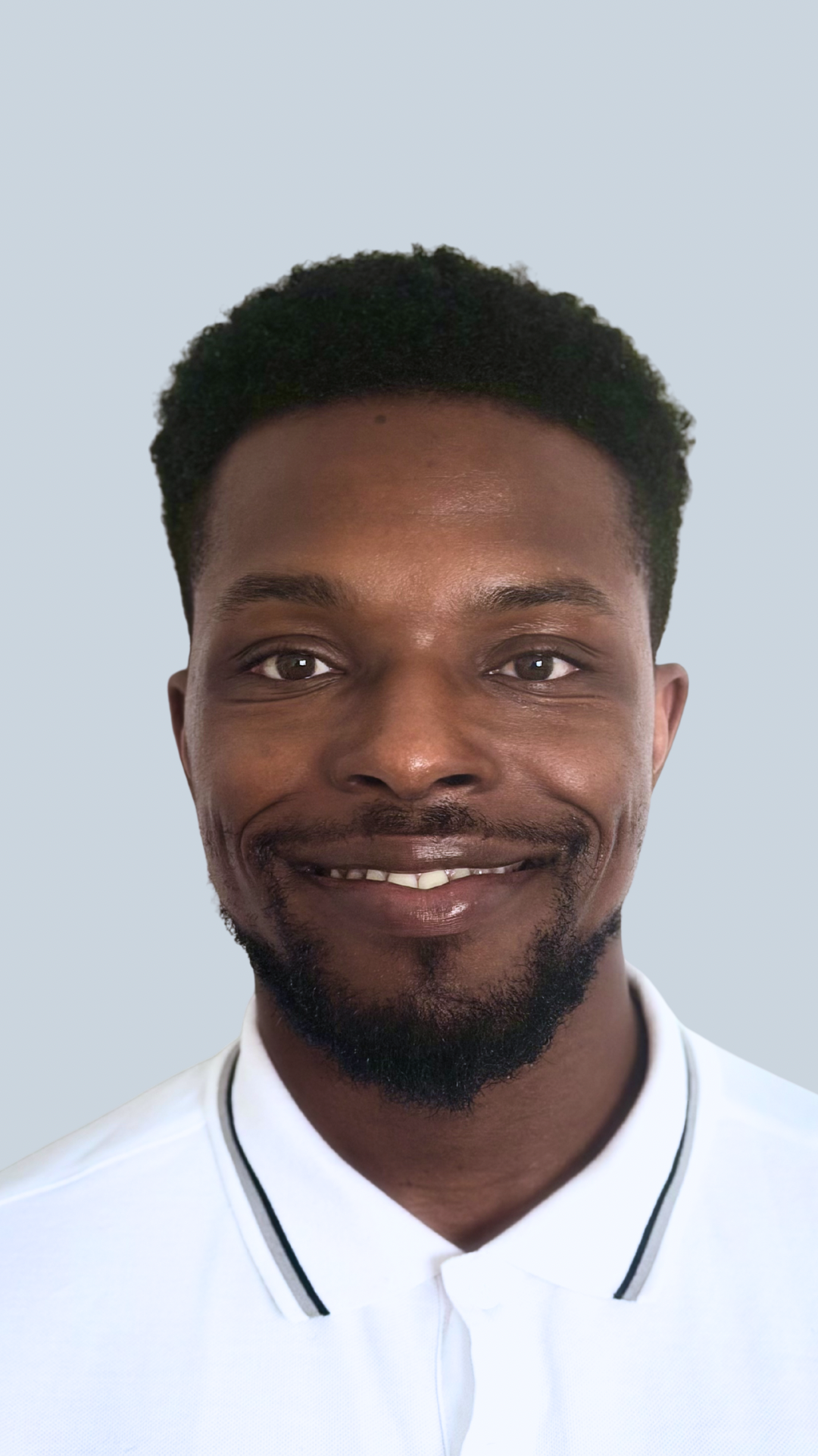 Photo of  Director and Founder of JBK SEN Support, Joshua Kitt, SEN Practitioner with over 17 years of extensive professional and lived experience working with families and children with additional needs. Uses an informed and proved approach pedagogy