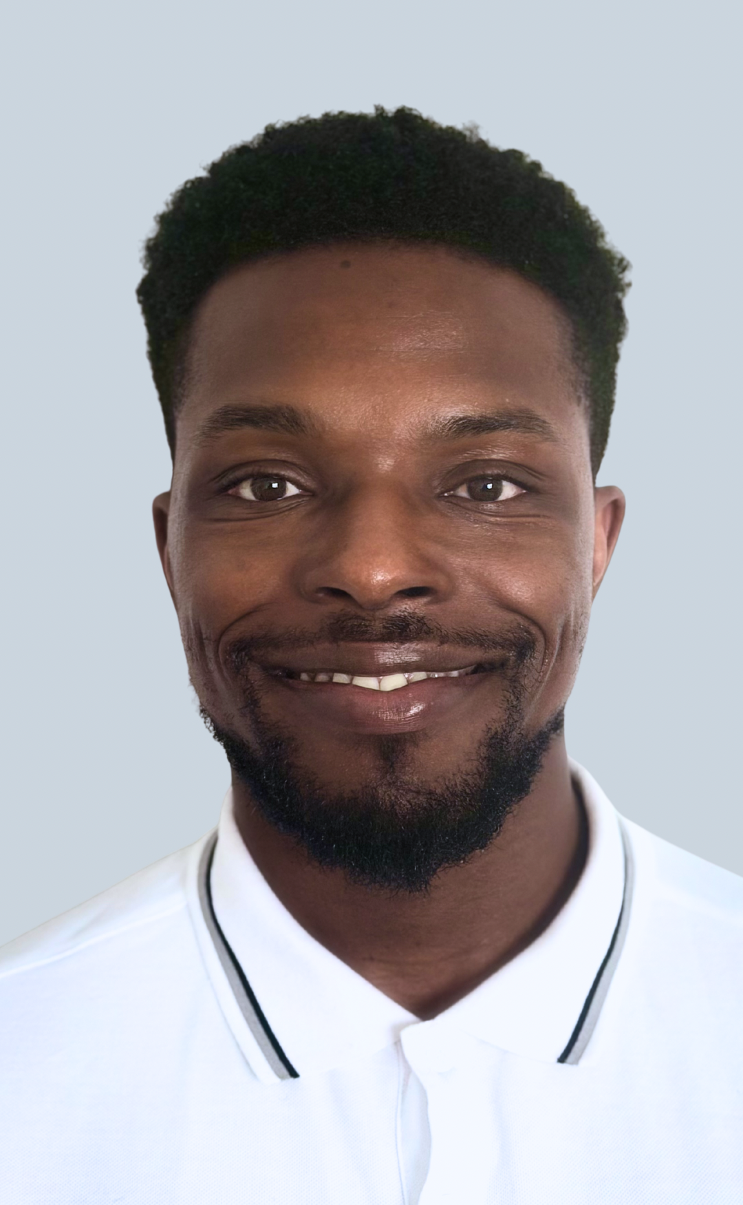 Photo of  Director and Founder of JBK SEN Support, Joshua Kitt, SEN Practitioner with over 17 years of extensive professional and lived experience working with families and children with additional needs. Uses an informed and proved approach pedagogy