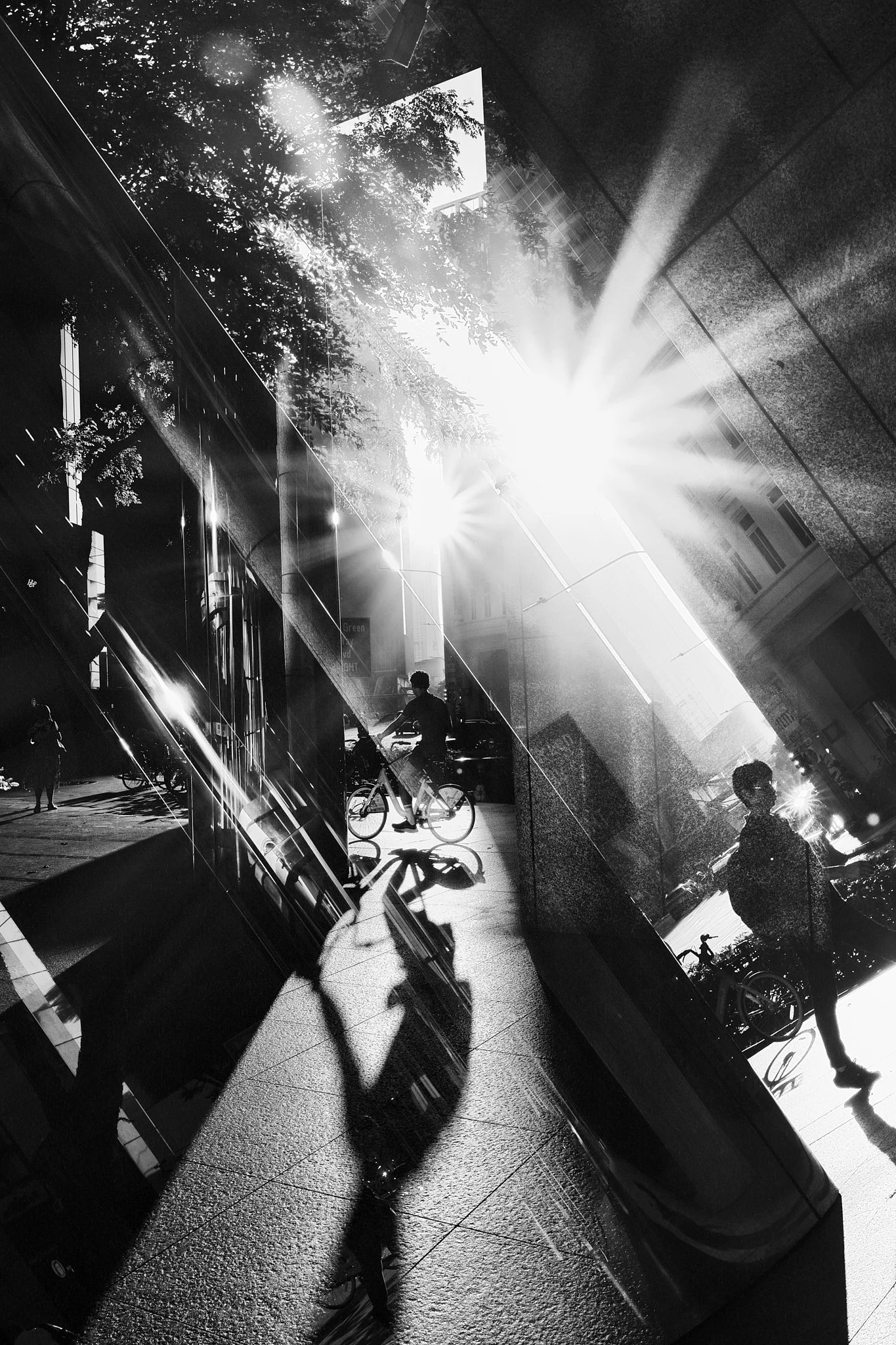 Morning Rush – The Hustle to the Desk was photographed at Raffles Place in the early morning, capturing the flow of office workers moving through the city as the day begins. The image reflects the rhythm, urgency, and quiet momentum of the daily comm