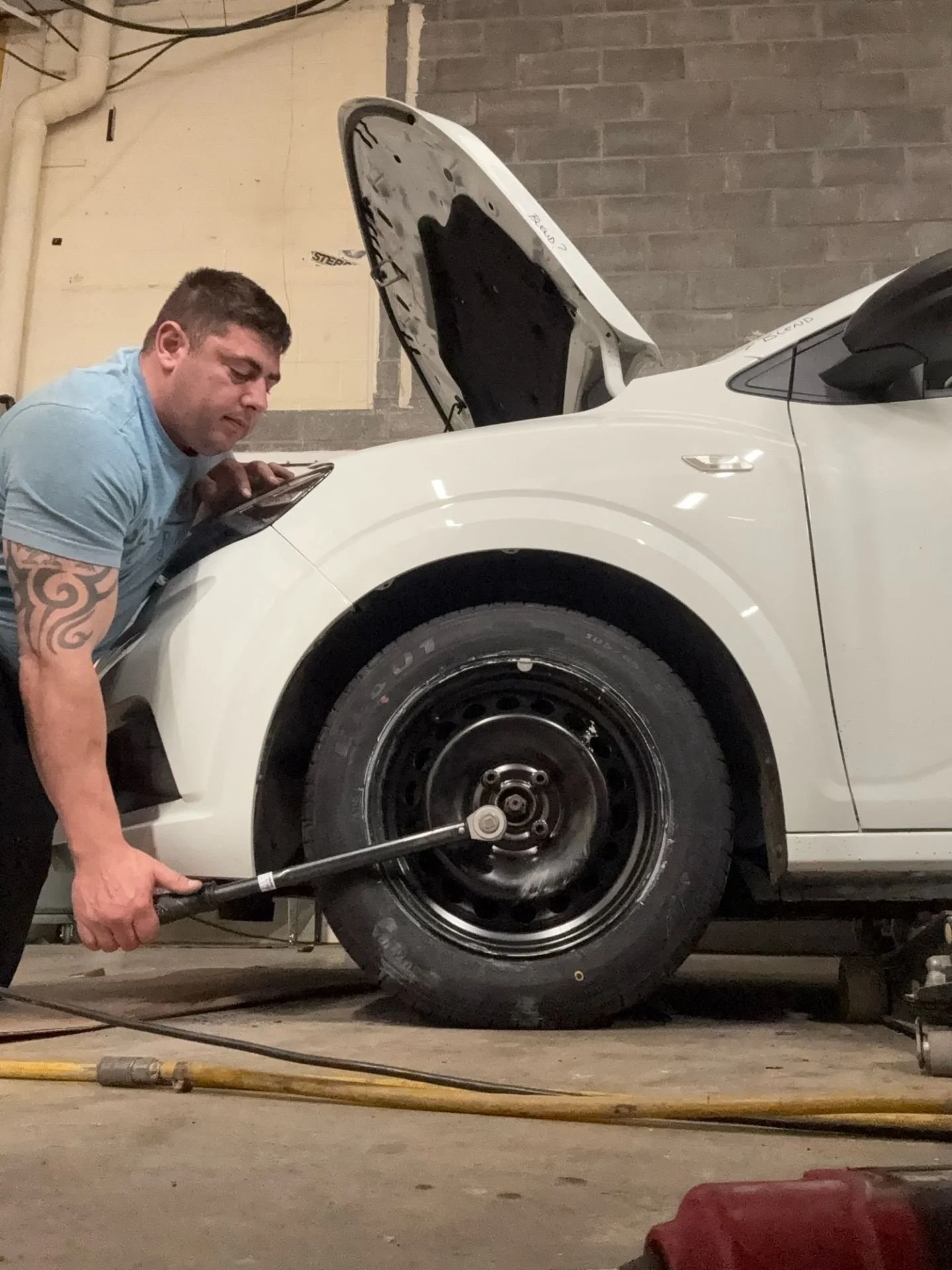 Dacia Sandero Wheel being tightened after replacement