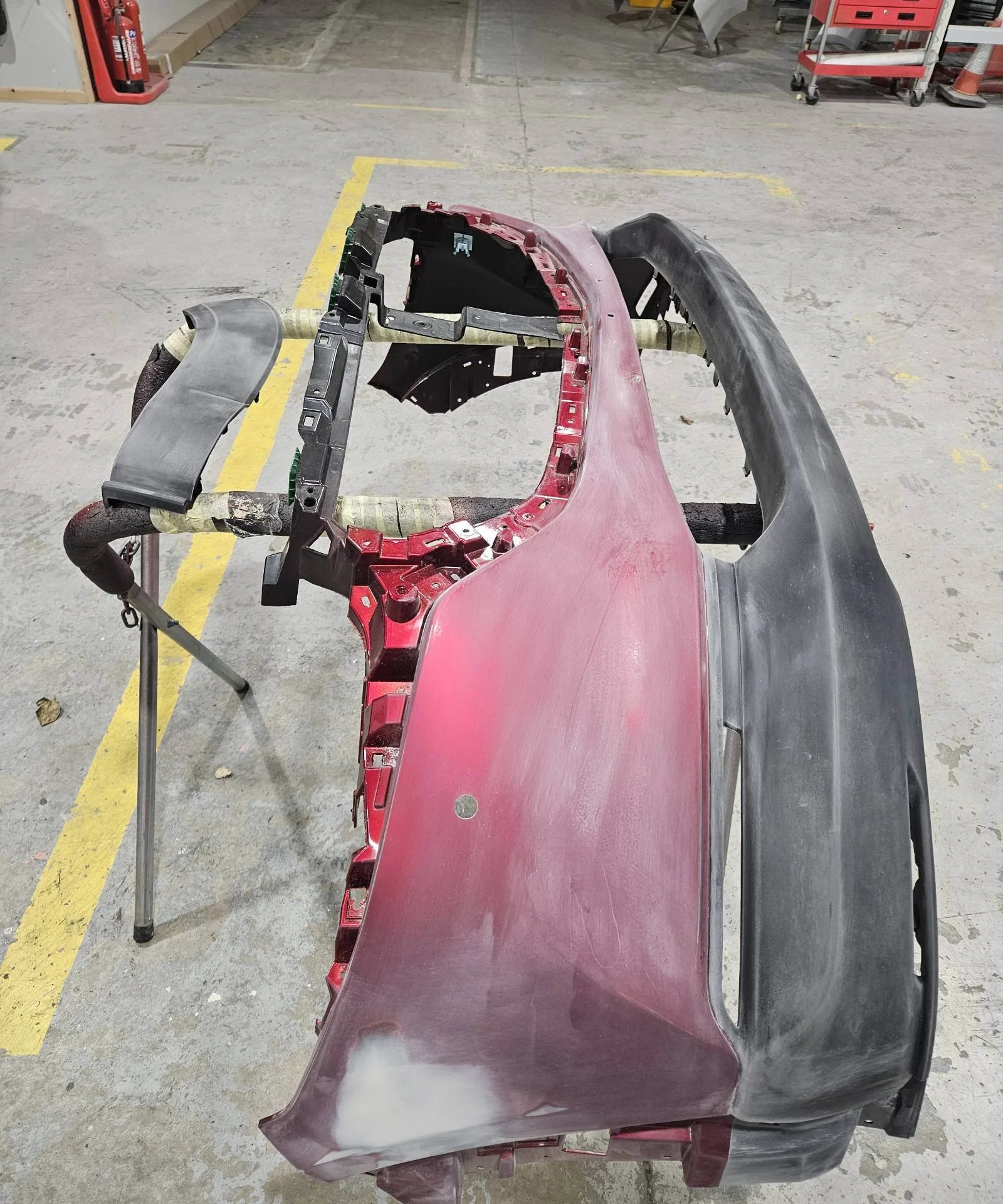 Mazda Soul Red Bumper Scotched Ready for Paint