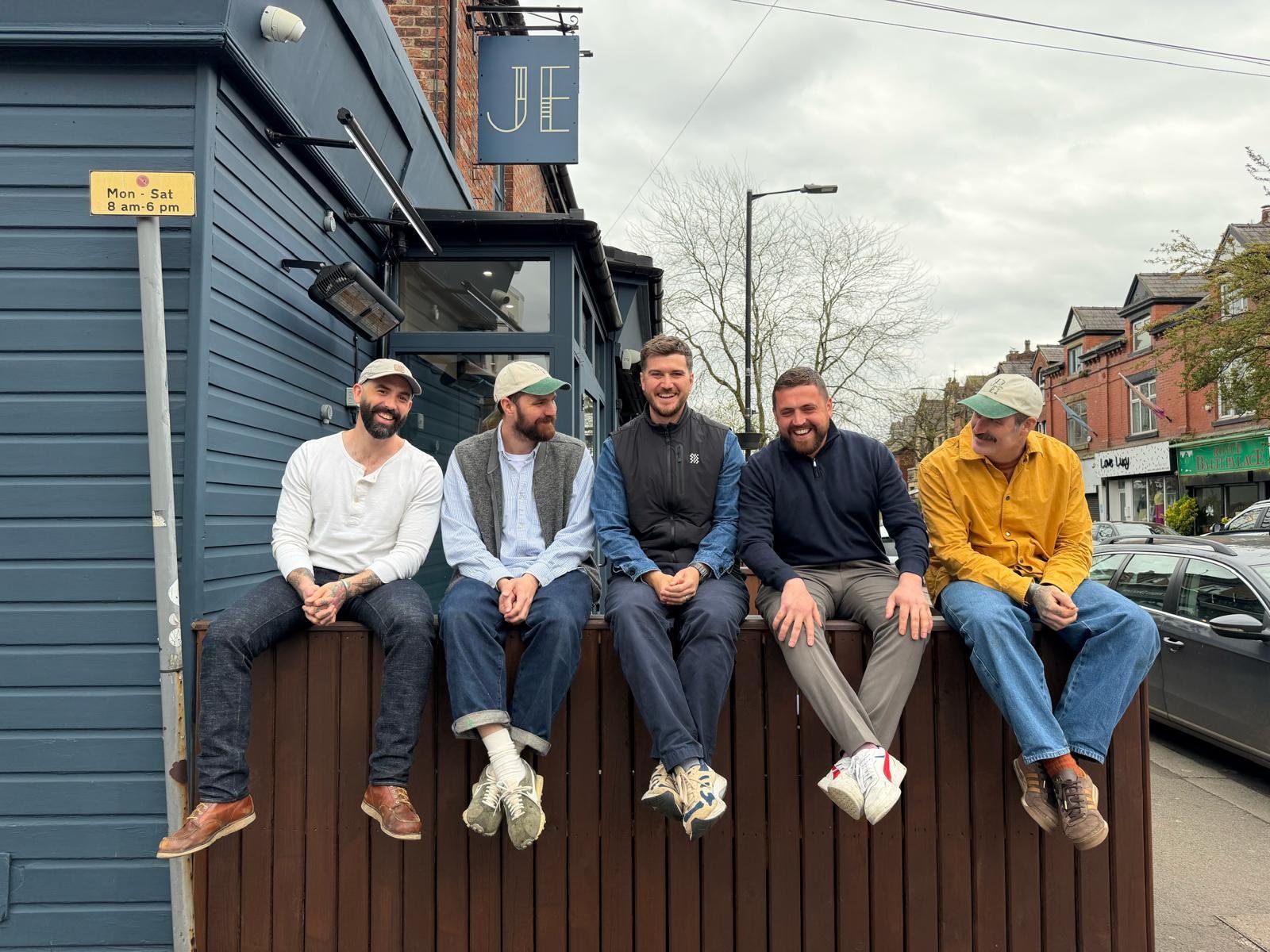 The team behind The Jane Eyre restaurants sitting outside their Chorlton location