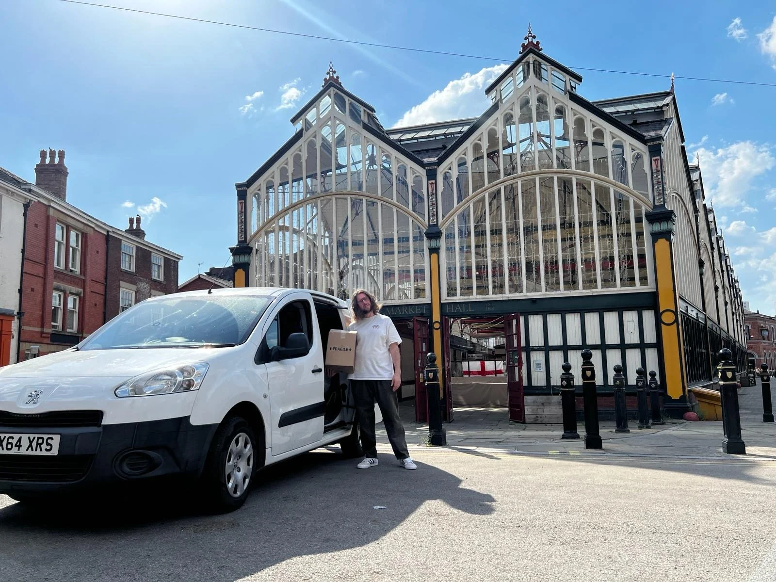 WineBoy outside Stockport Market Hall with Van getting ready to deliver wine