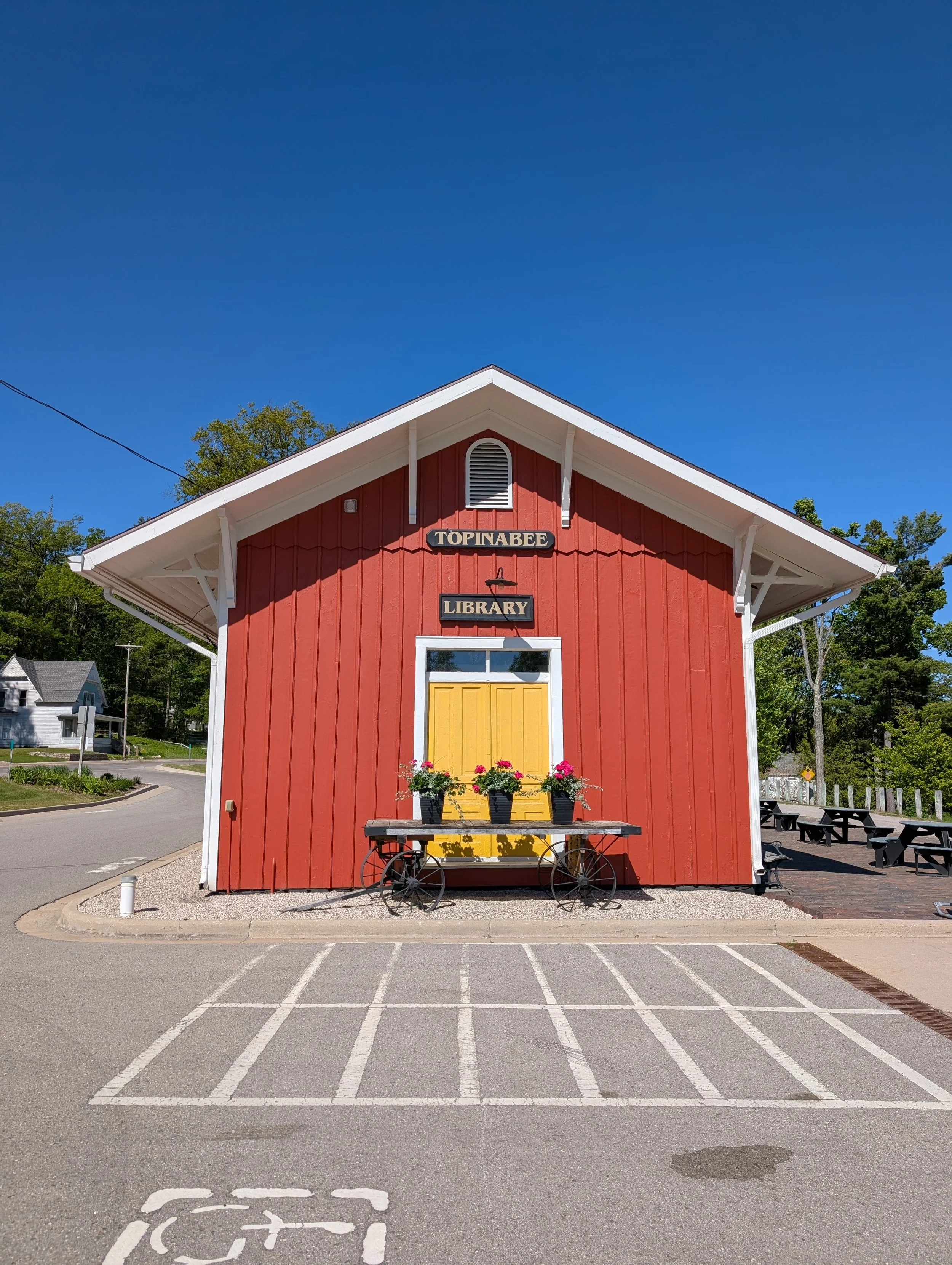 red building Topinabee, MI Library