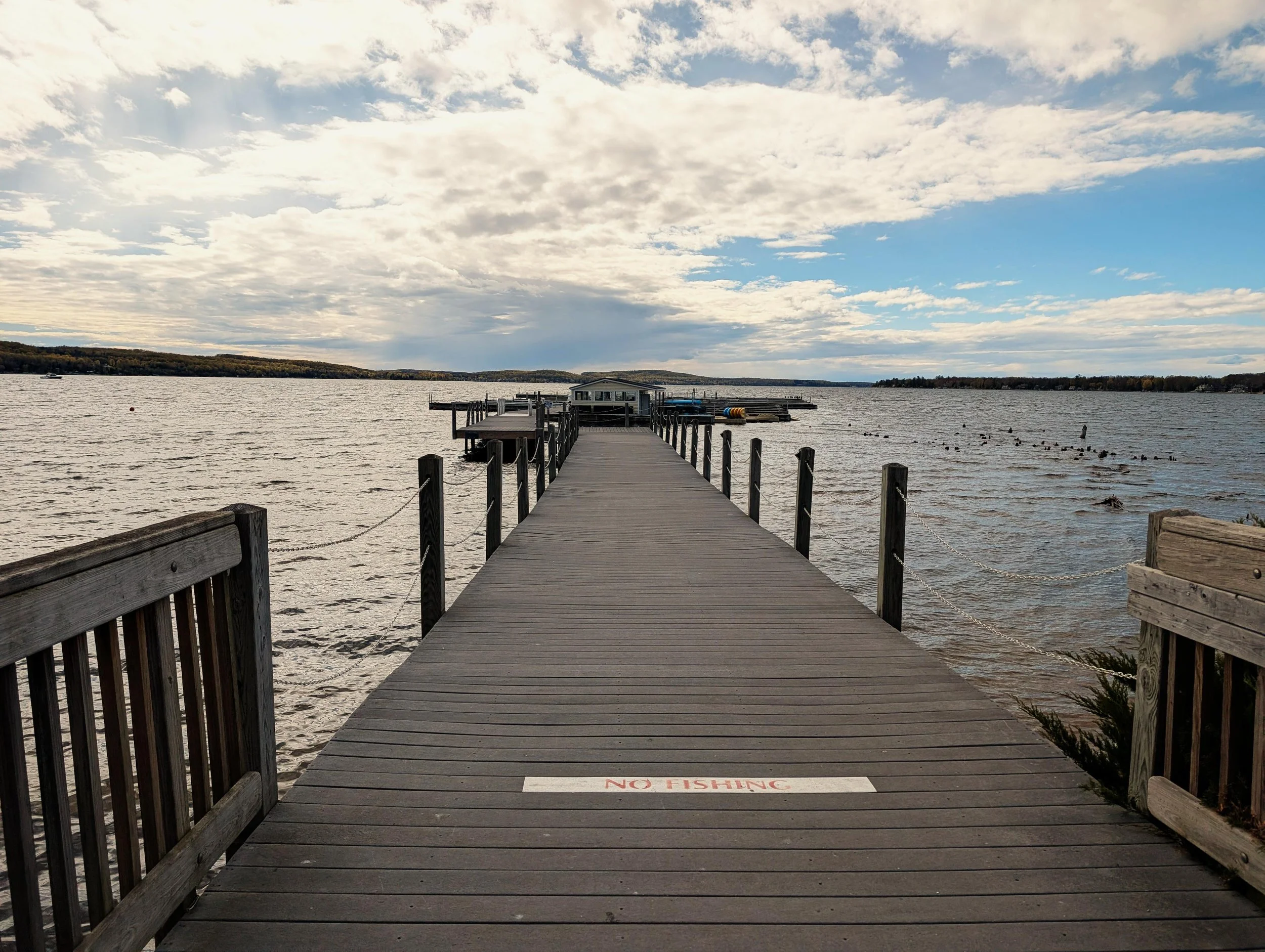 Empty Boyne City marina dock on Lake Charlevoix in early spring