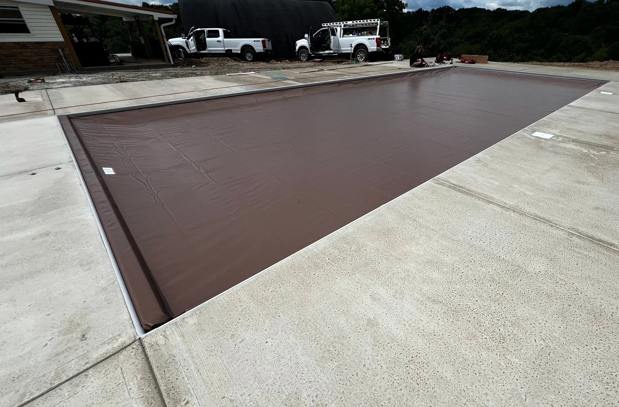 Professionally installed automatic pool cover in Western PA.
