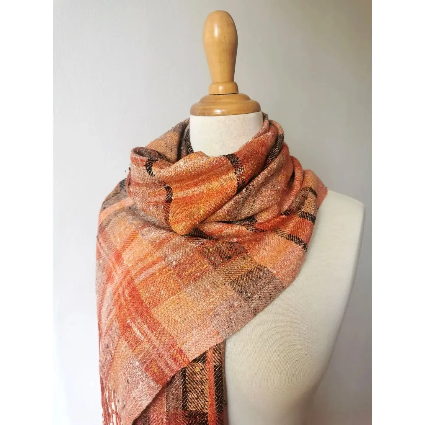 A very lightweight scarf in autumnal colours, made from shantung silk spun using the jasp&eacute; technique, which gives the yarn these varied shades of texture and colour. A beautiful silk spun by Bart and Francis in Belgium. I really like the effec