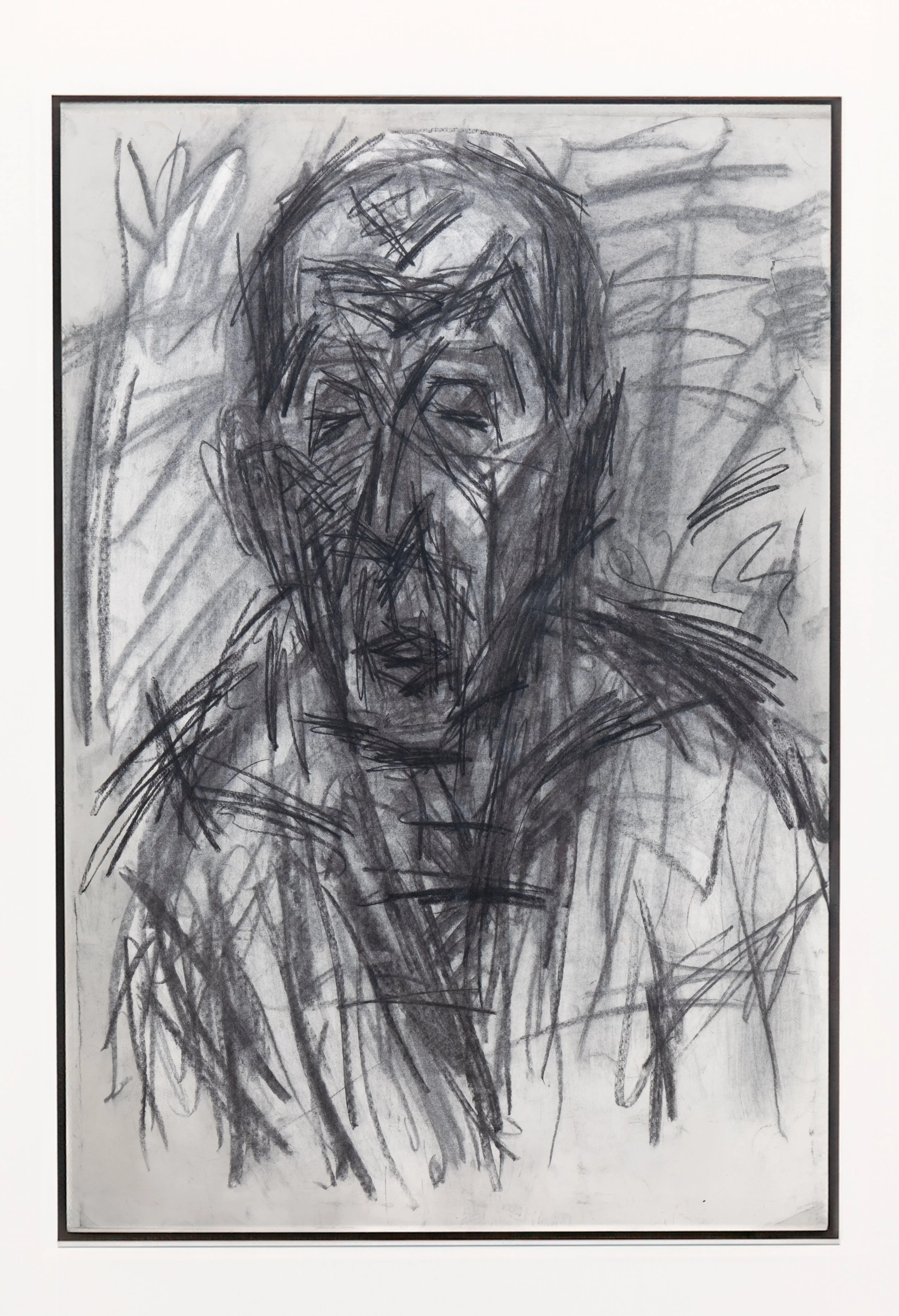 Abstrakte Schwarz-Weiß-Skizze eines menschlichen Gesichts mit ausdrucksstarken und chaotischen Linien.
