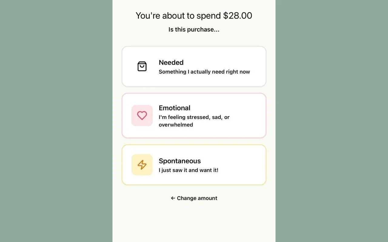 Mobile app screen showing a purchase amount of $28.00 with options for needed, emotional, and spontaneous purchase reasons.