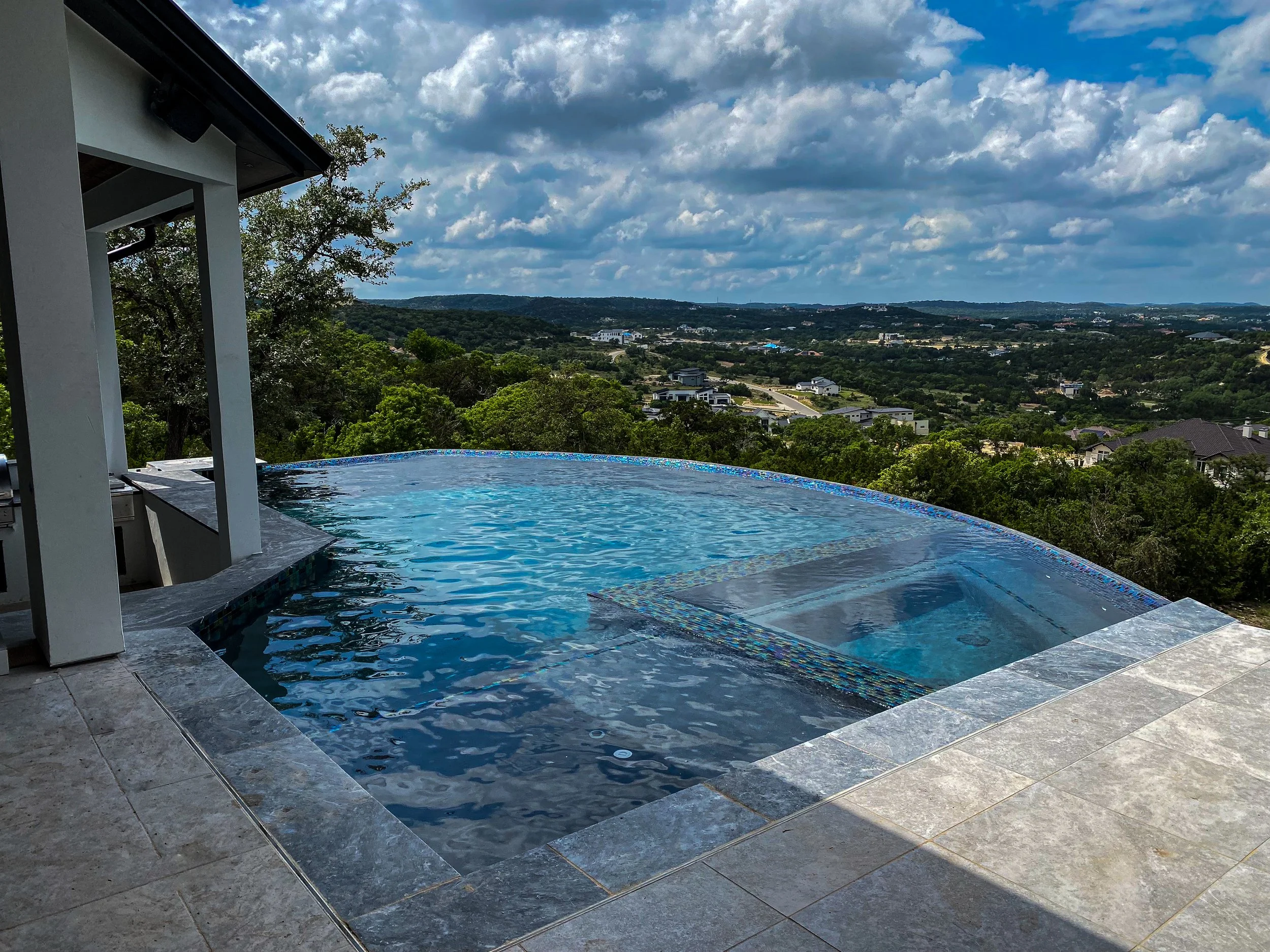 Luxury custom in-ground infinity edge pool in San Antonio Texas by Christopher Ashley Pools